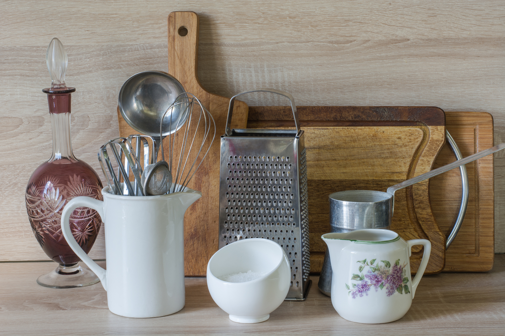 crockery, tableware, utensils and other different stuff on woode