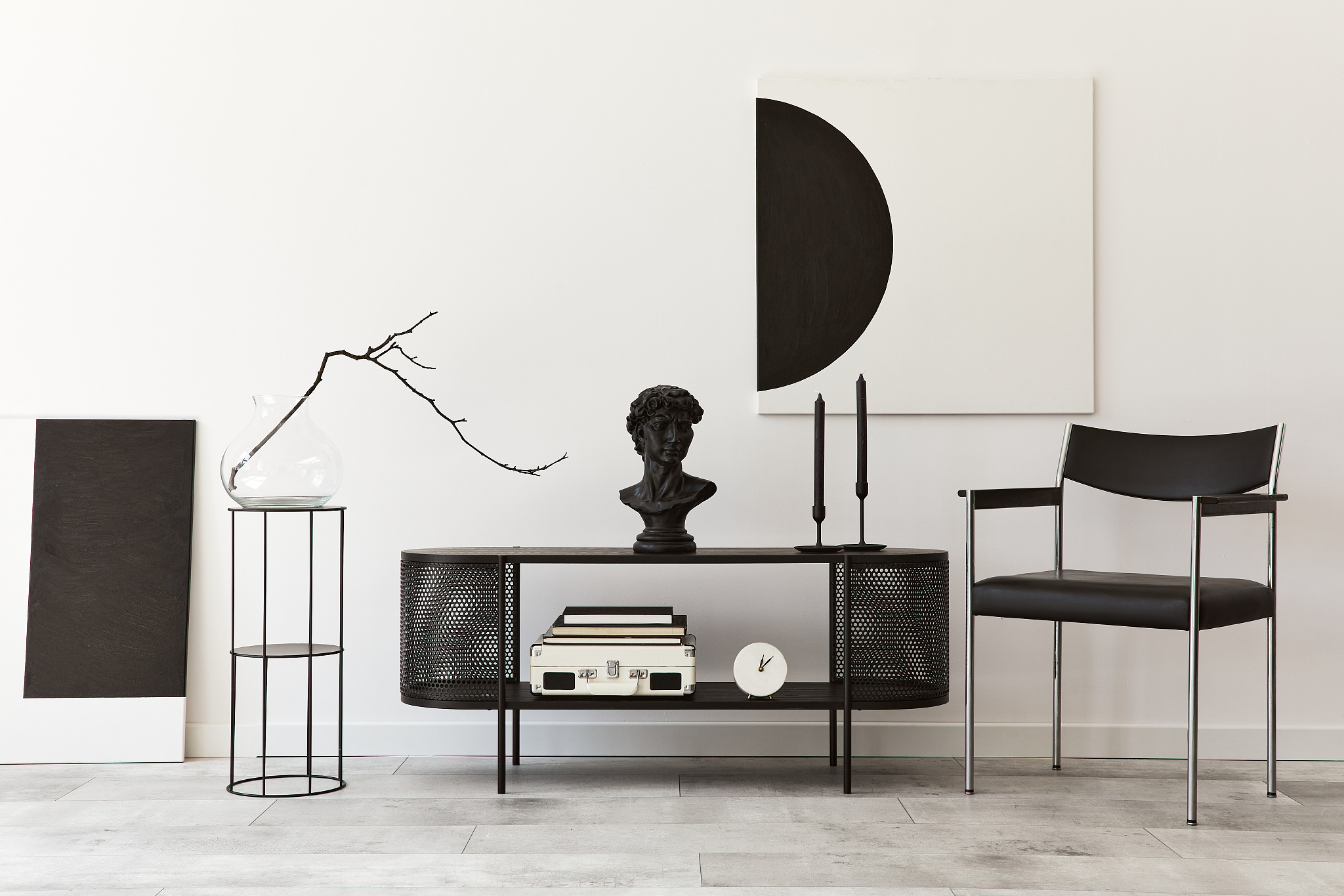 interior design of modern living room with black stylish commode
