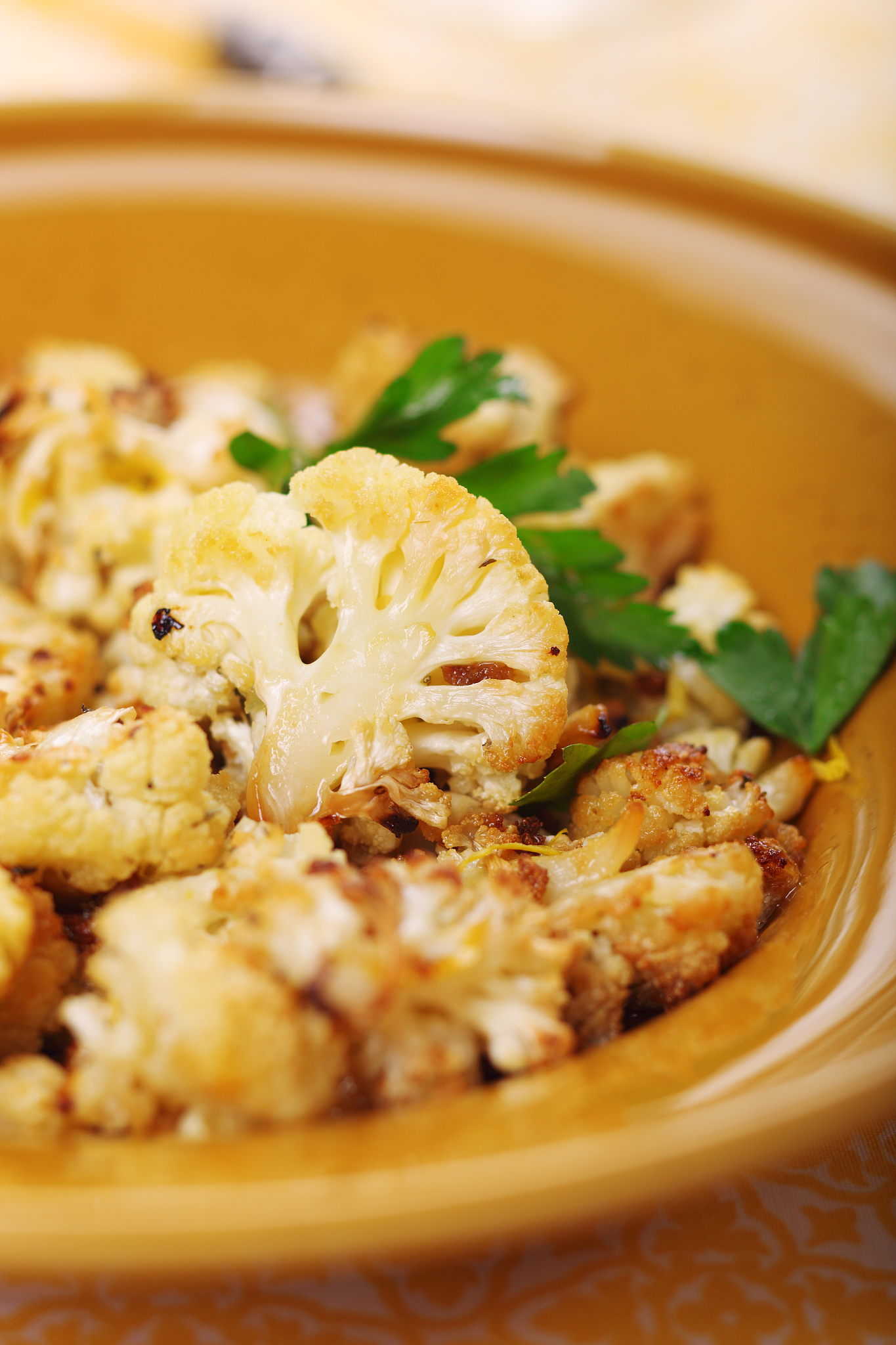 roasted cauliflower with lemon peel and garlic.