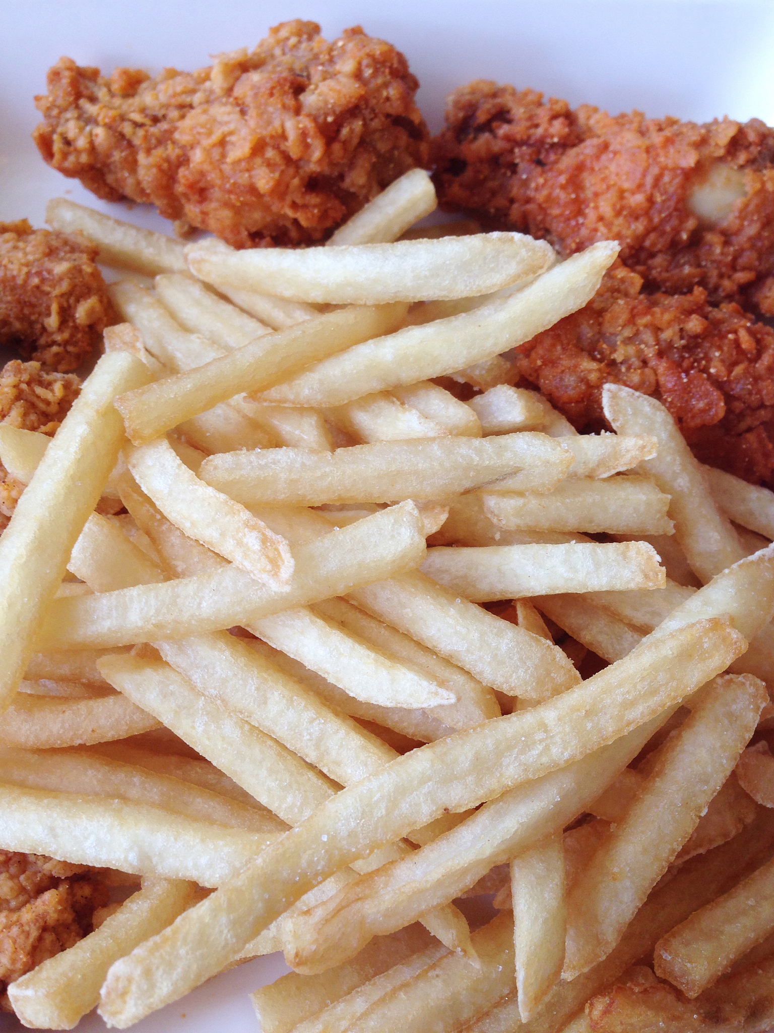 fried chicken and french fries on a table