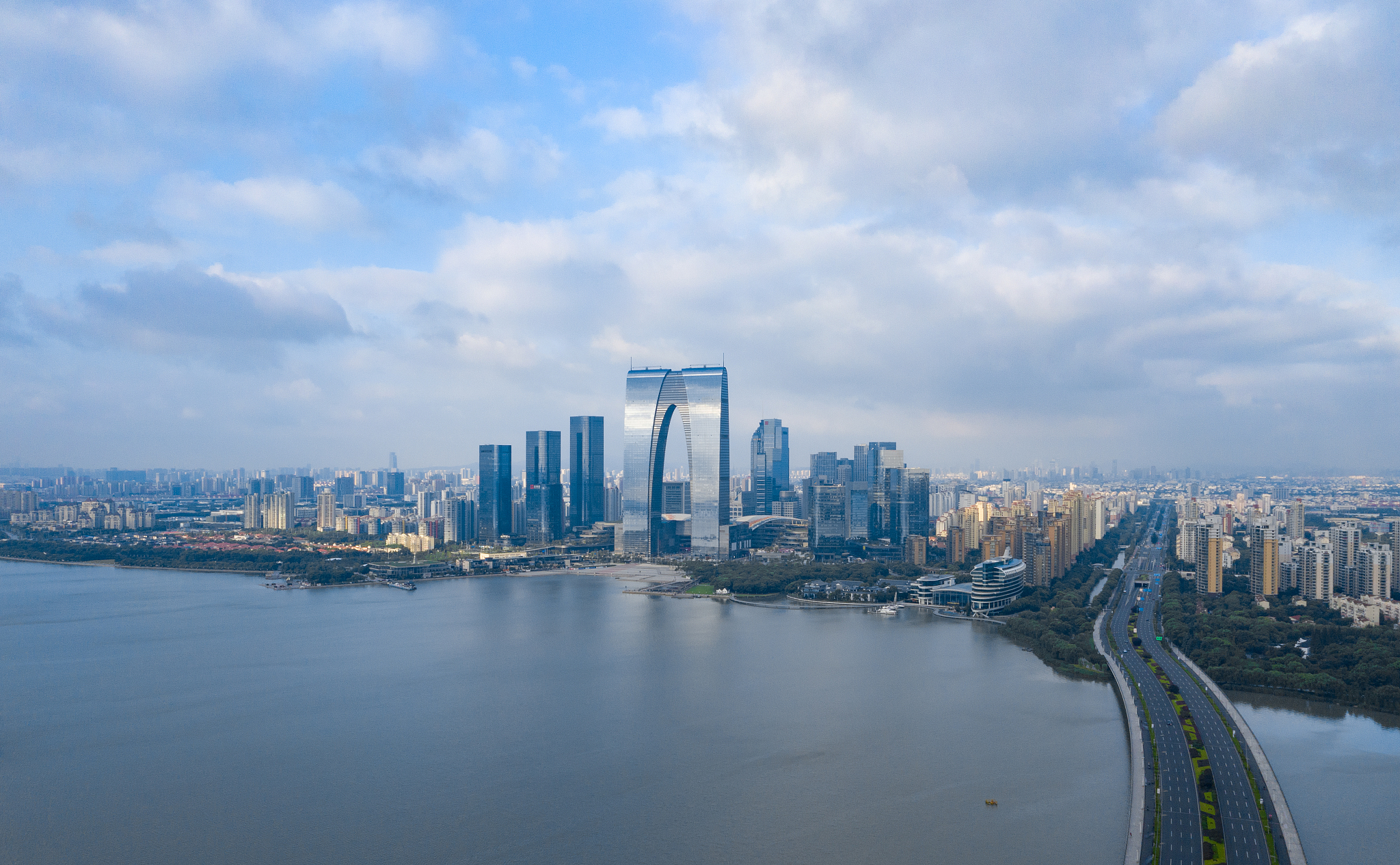 航拍苏州金鸡湖滨水现代城市风光