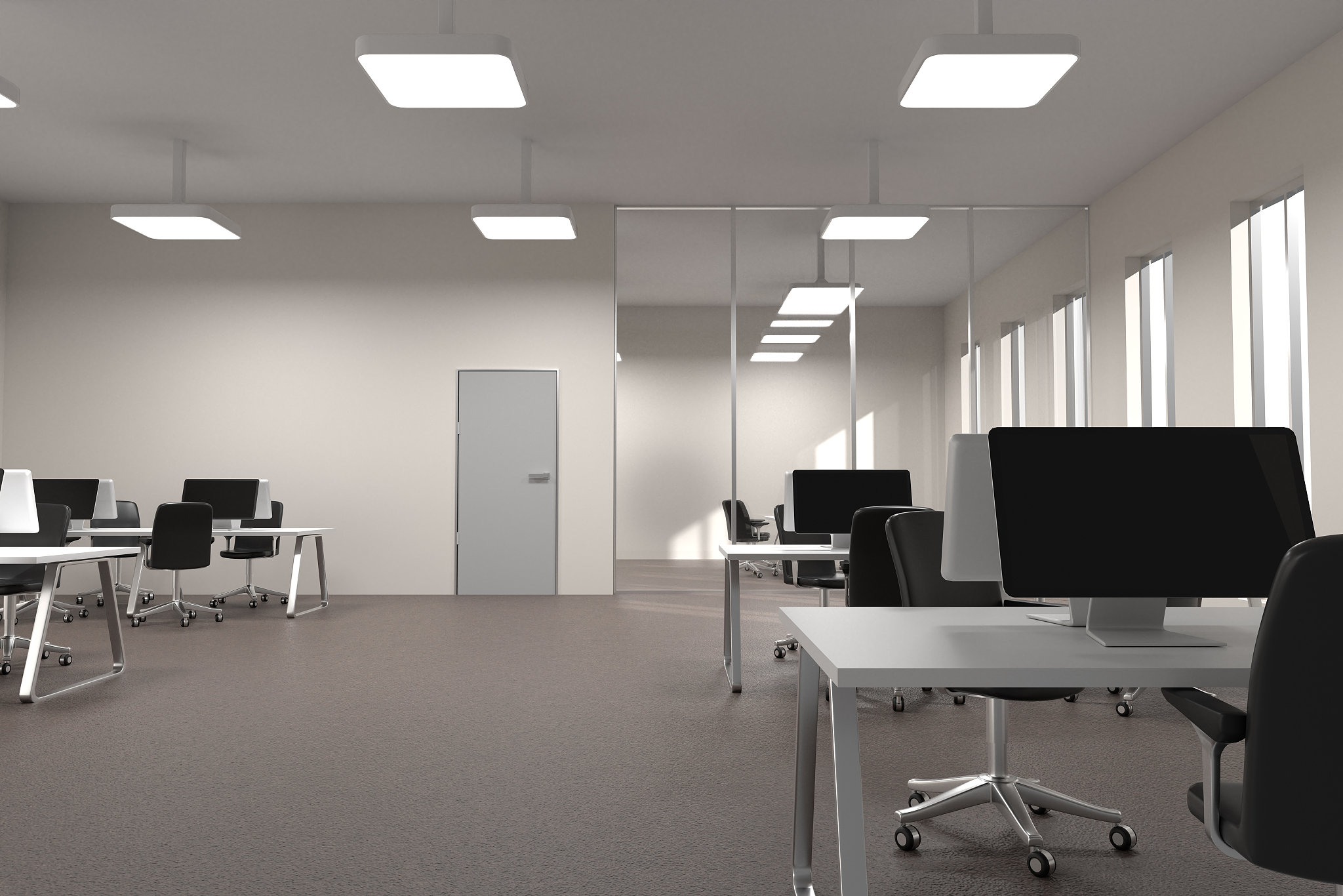 white open space office with empty wall and white windows