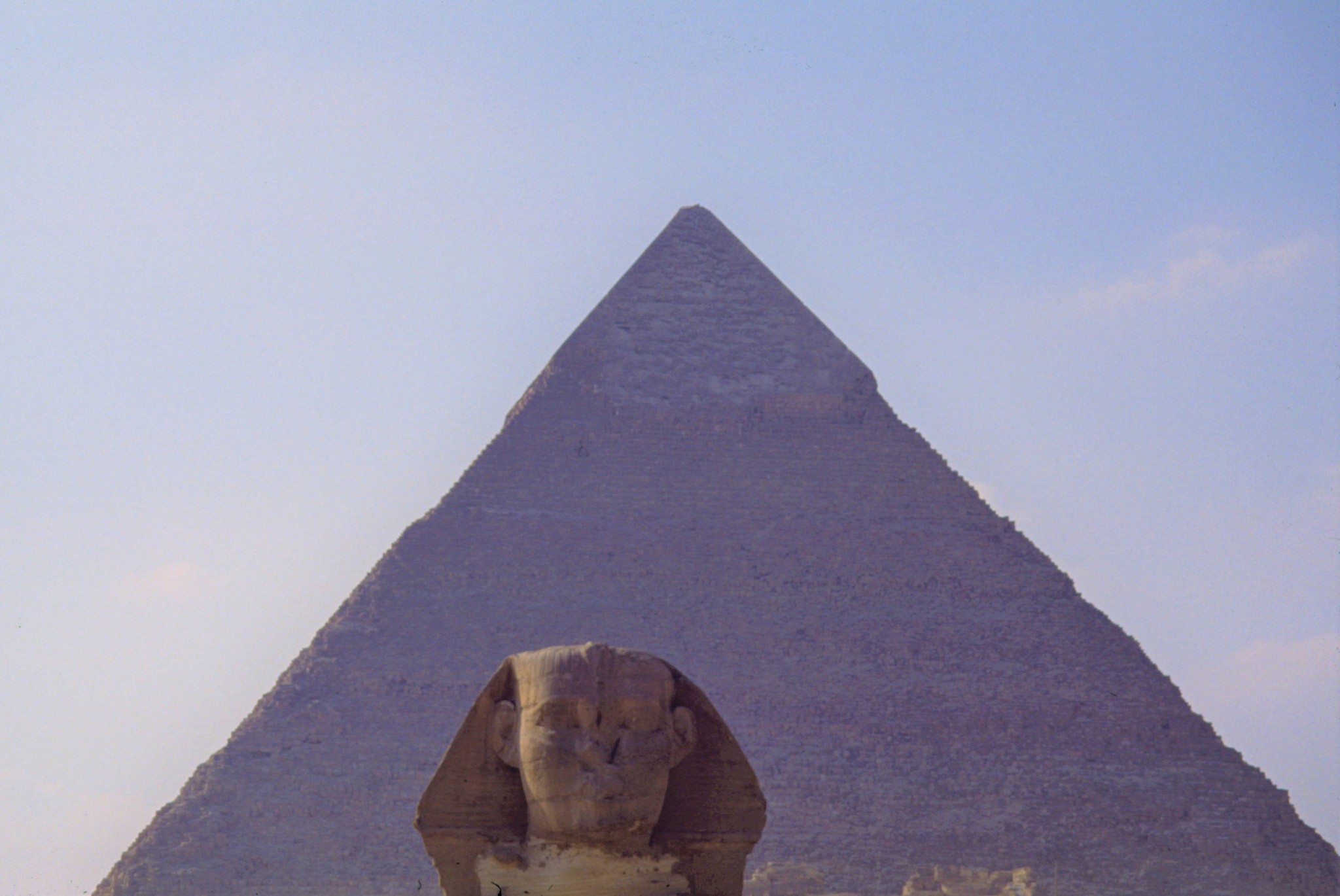 sphinx in front of pyramid khufu giza egypt