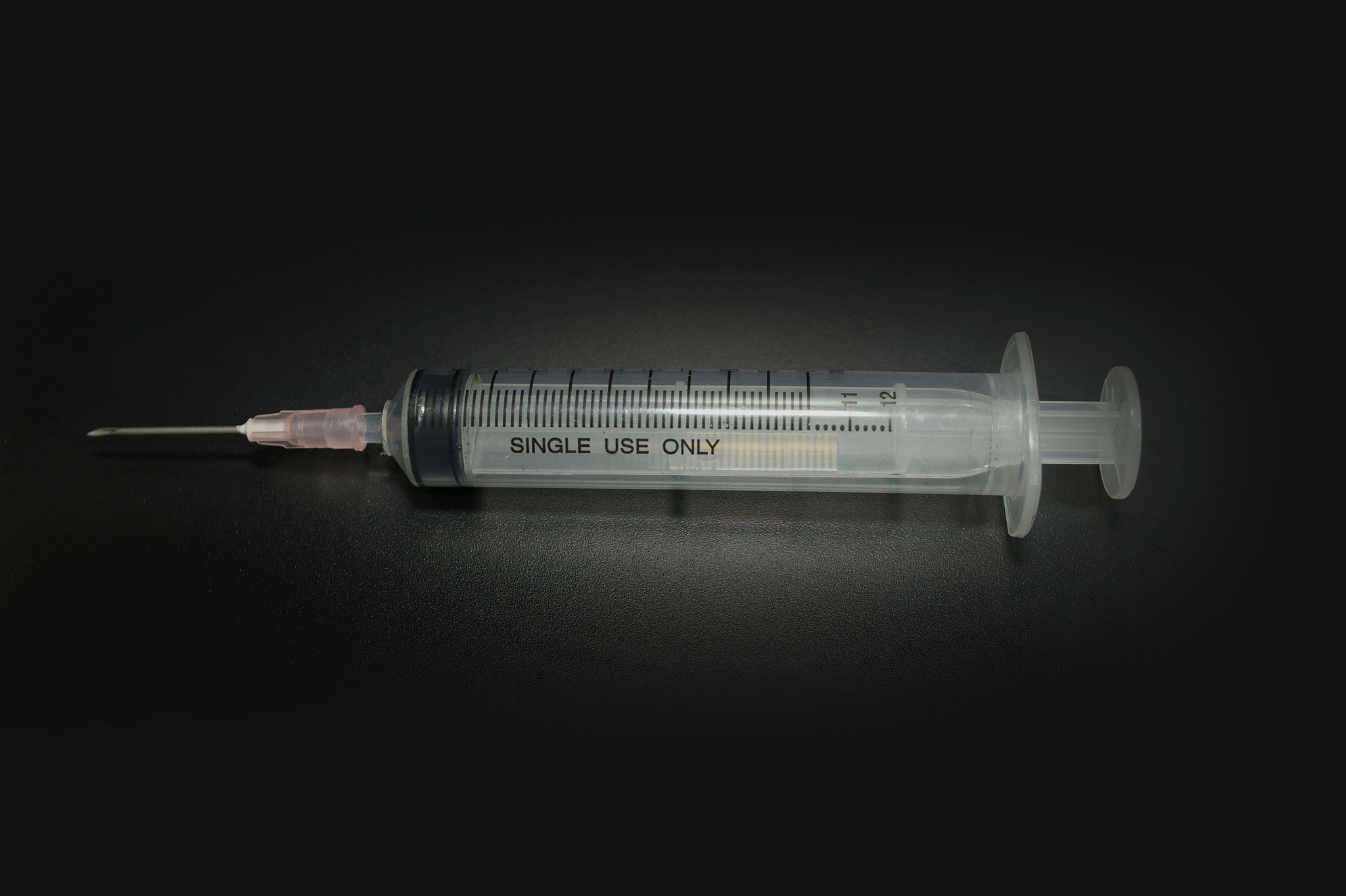 injection needle  on black background image
