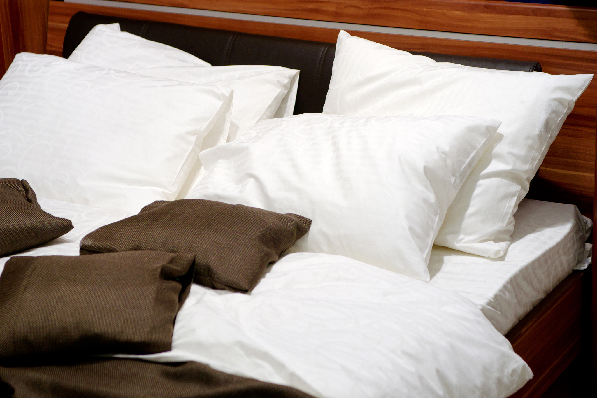 nice pillows on a contemporary bed