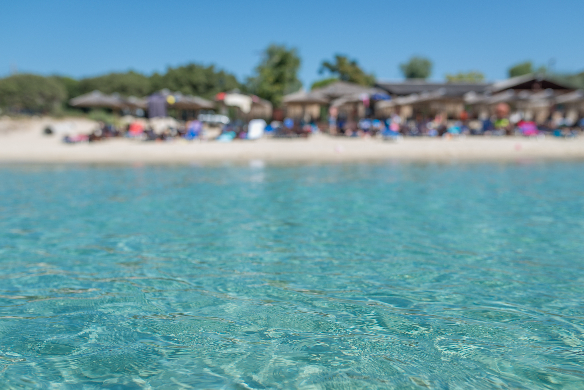 blurred picture of beach from sea, holiday concept