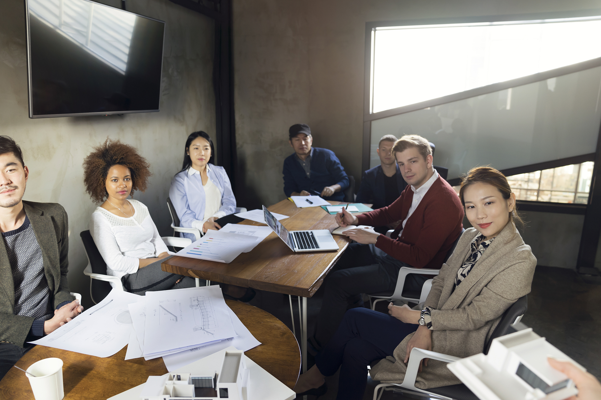 business people watching presentation in conference