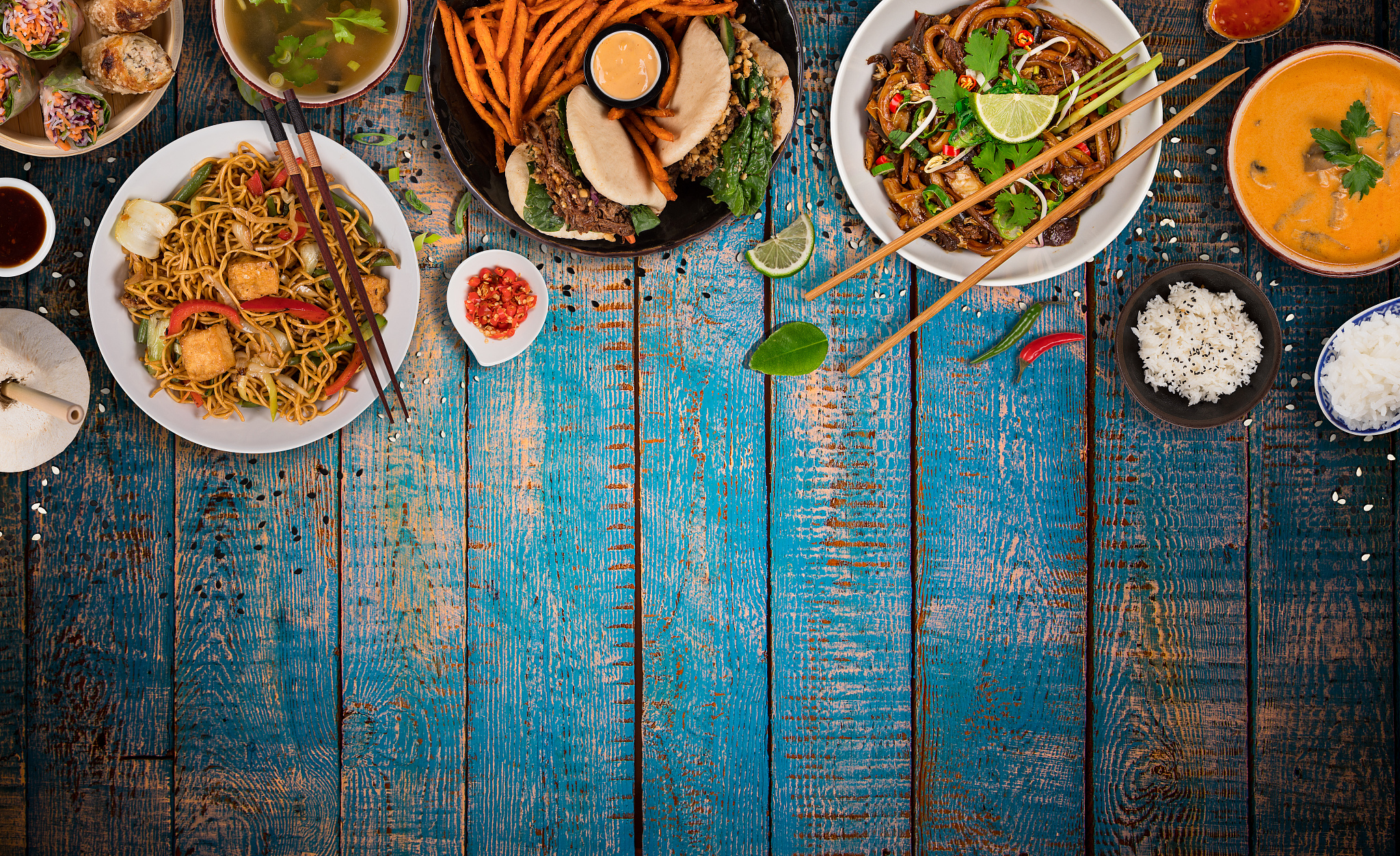 asian food background with various ingredients on rustic wooden 