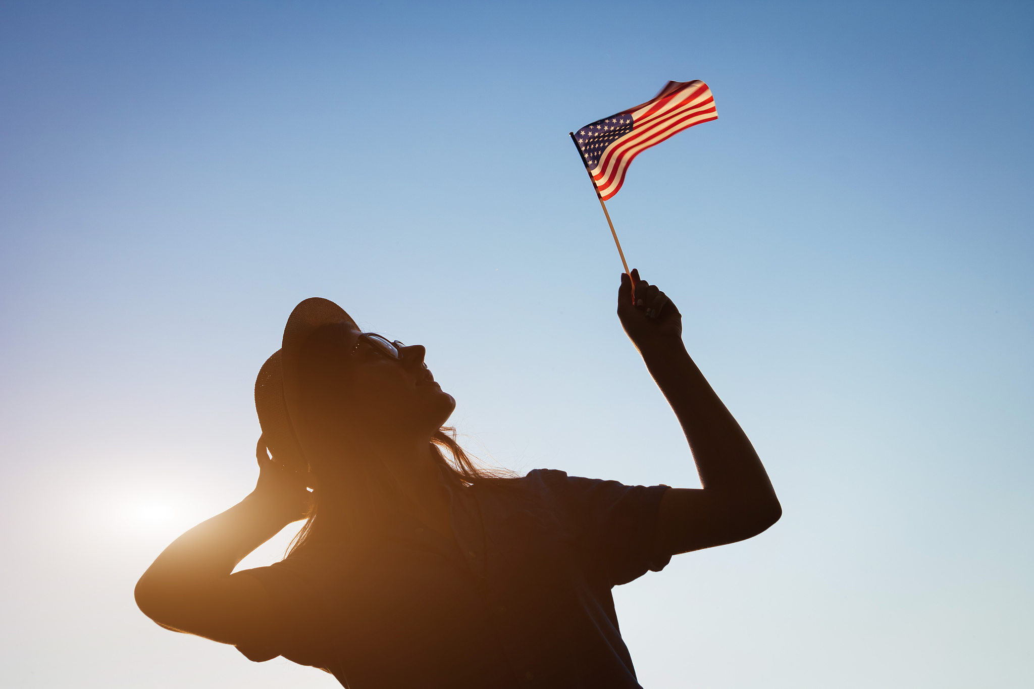 woman holding usa flag