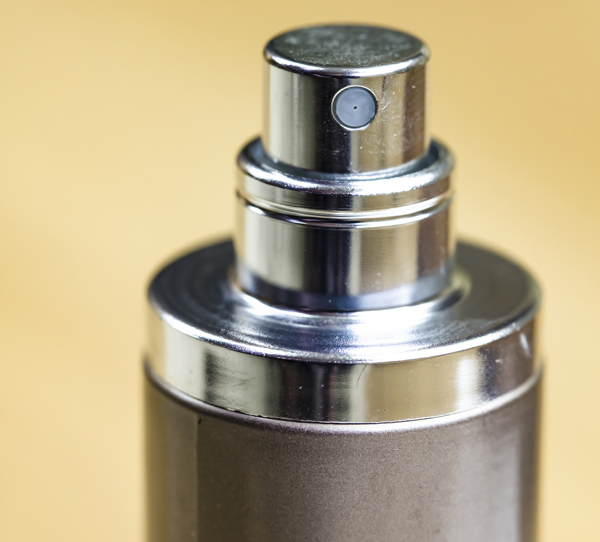 close-up of a scented perfume spray bottle