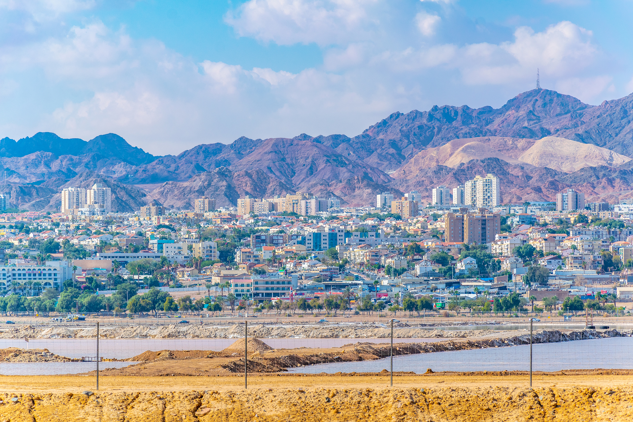 eilat viewed behind salt pans, israel