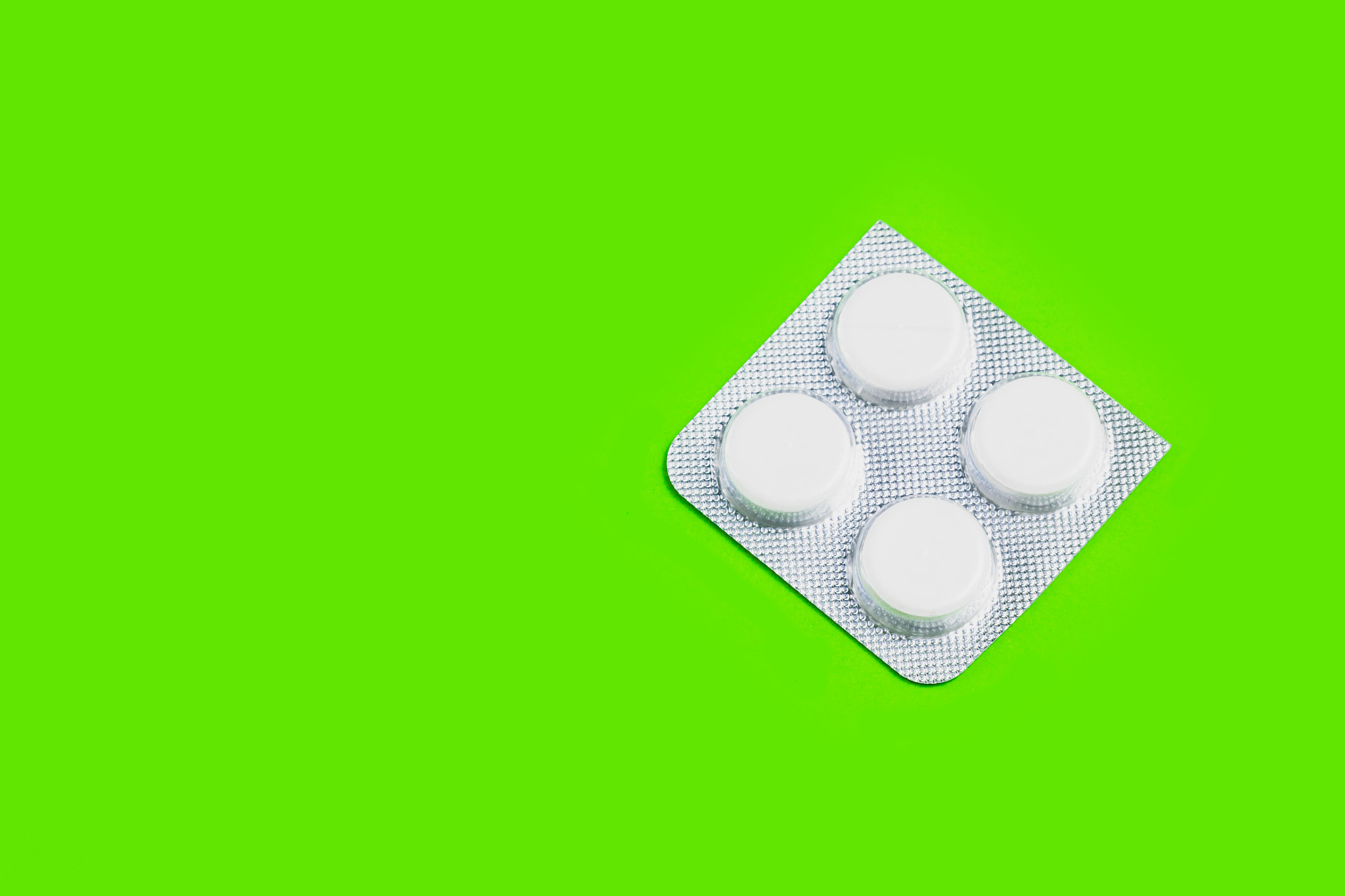 medication pills on a plain background. copy space one
