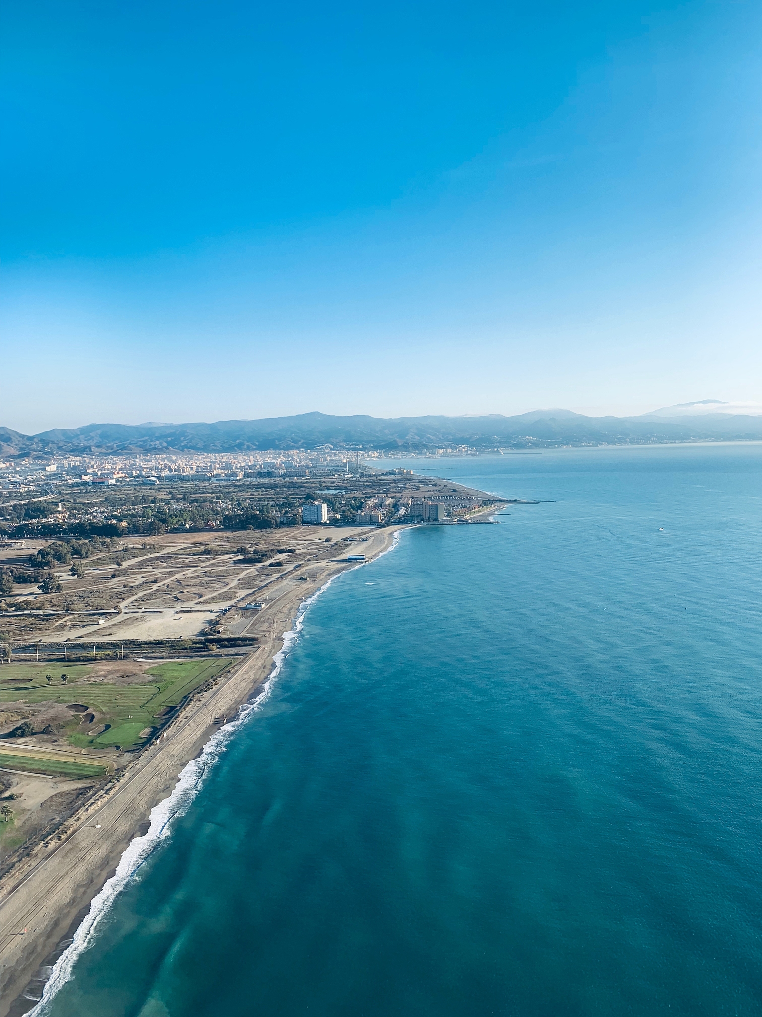 scenic view of sea against blue sky