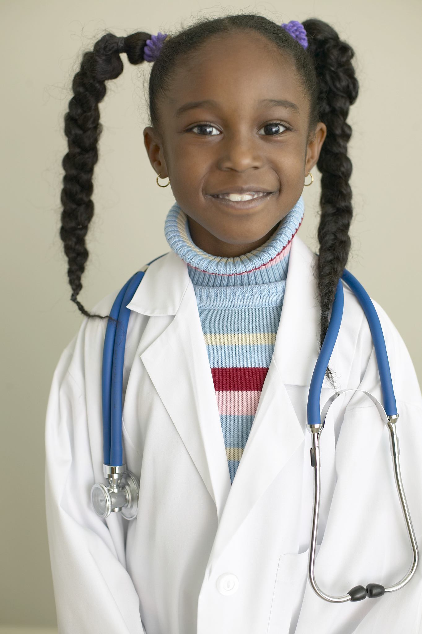 young girl playing doctor