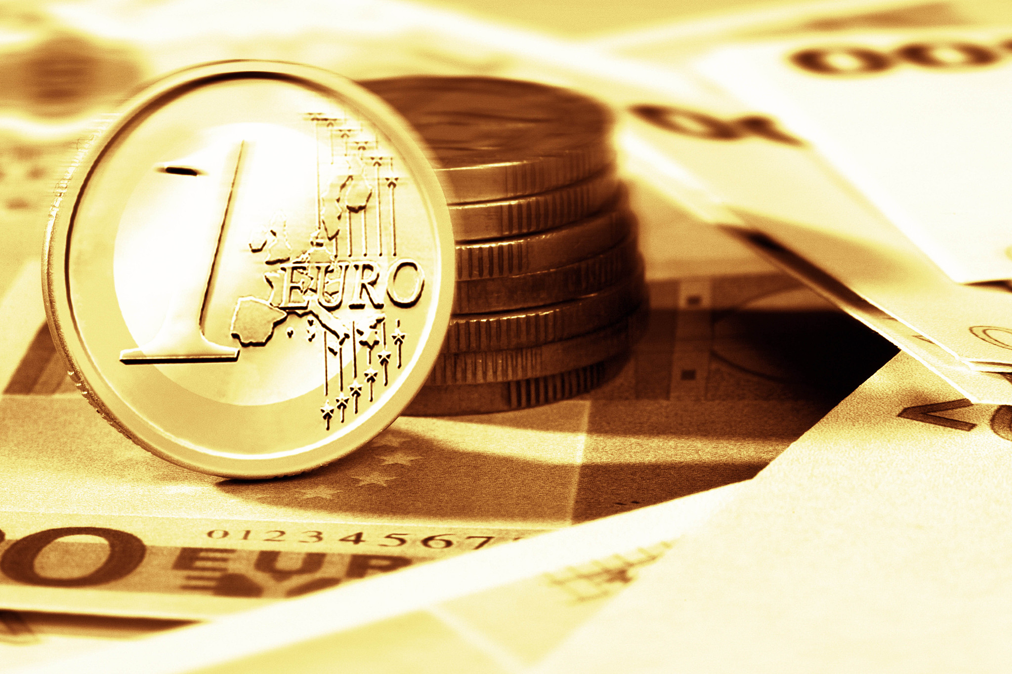 money: euro coins and bills close up