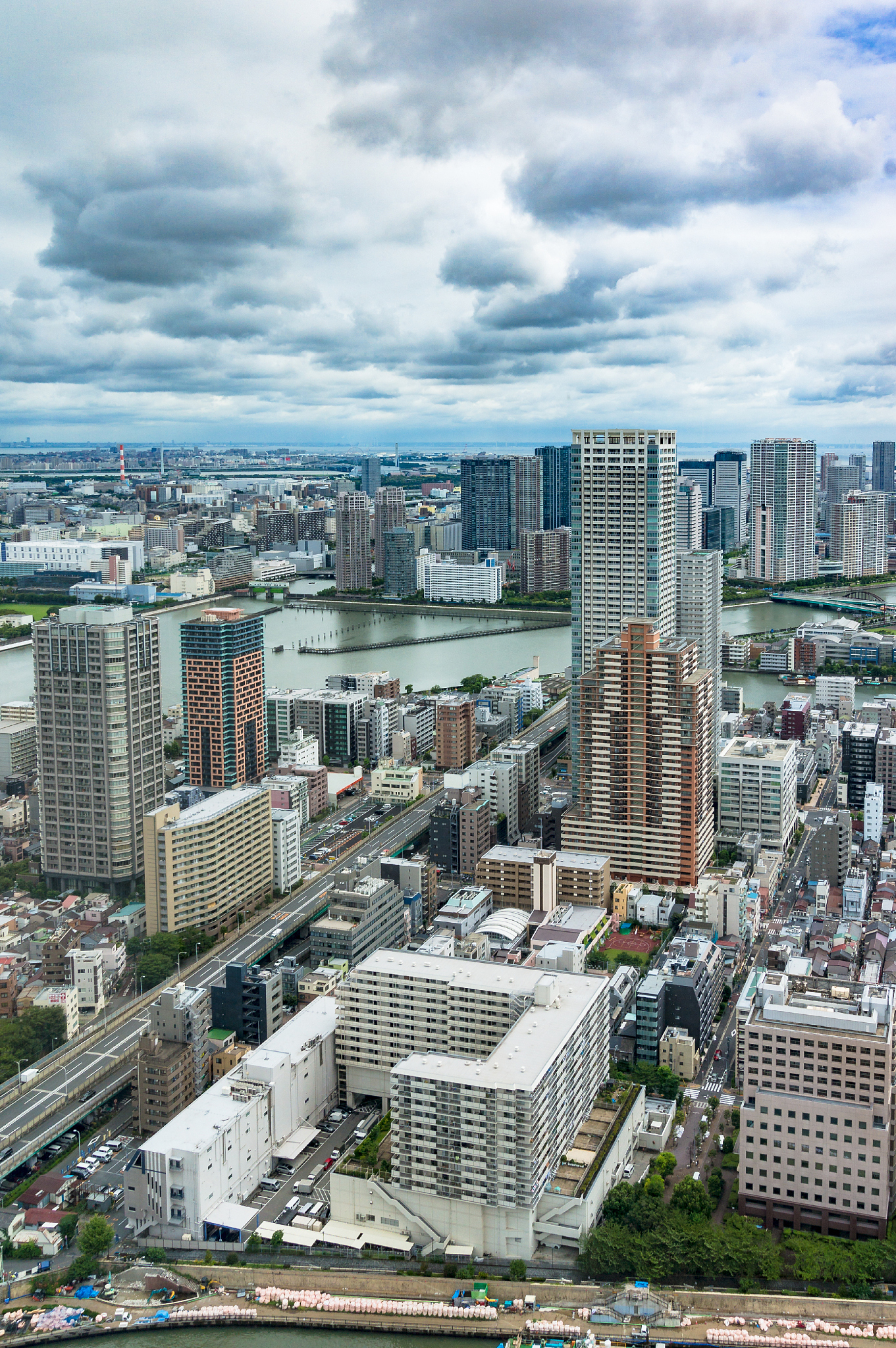 aerial view from above on tokyo suburb on sunny day