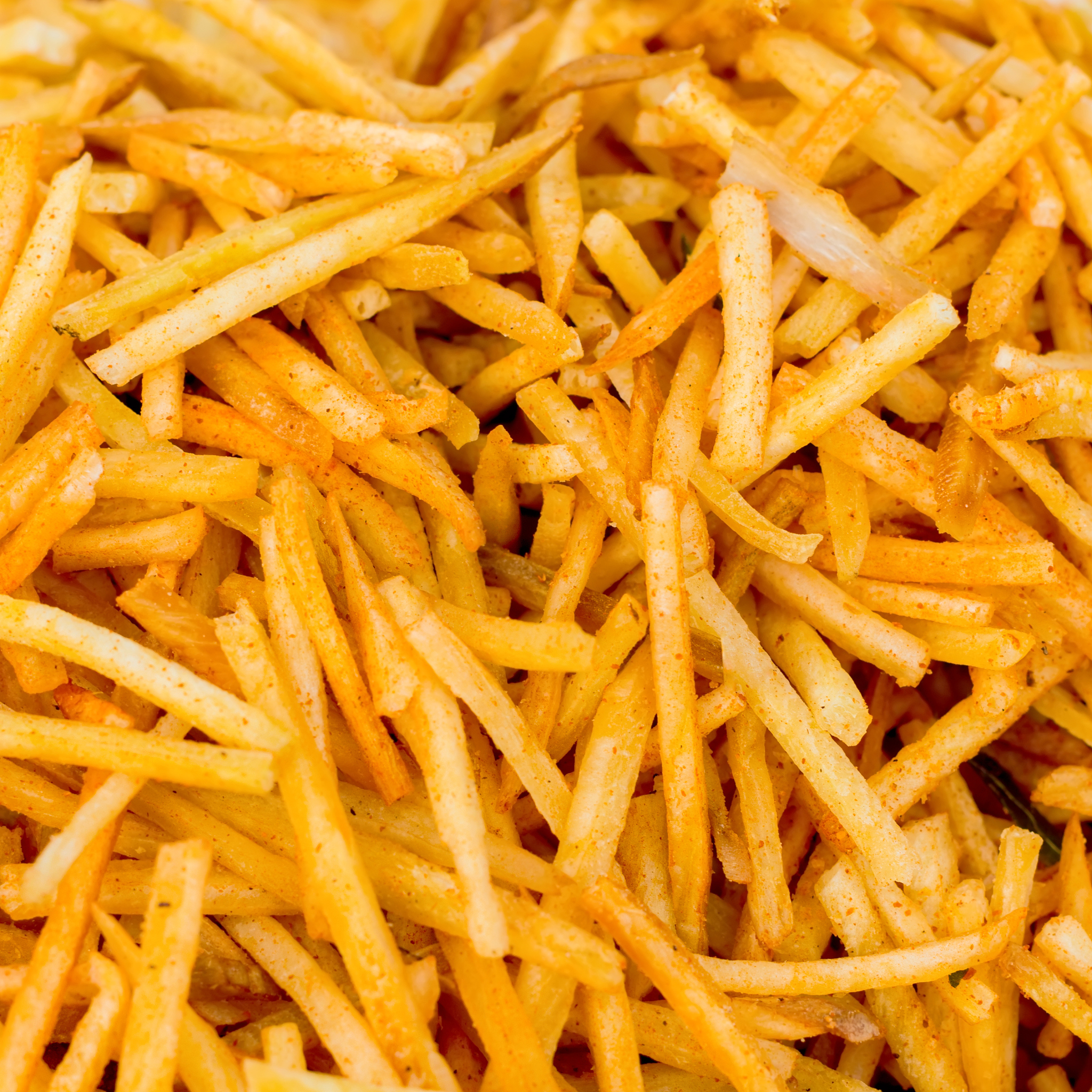 spicy french fries fast food snack like background from india
