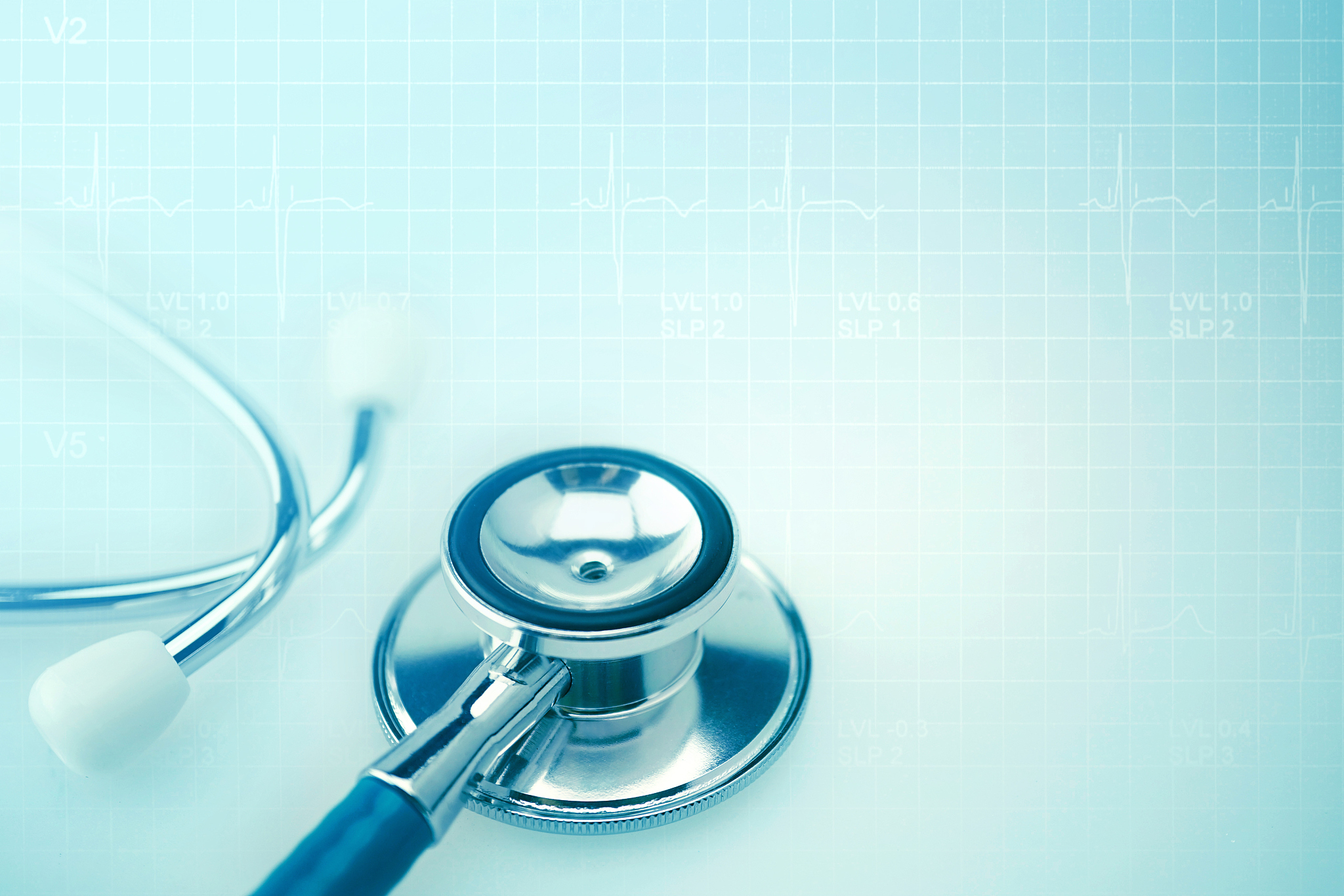 stethoscope on heartbeat graph