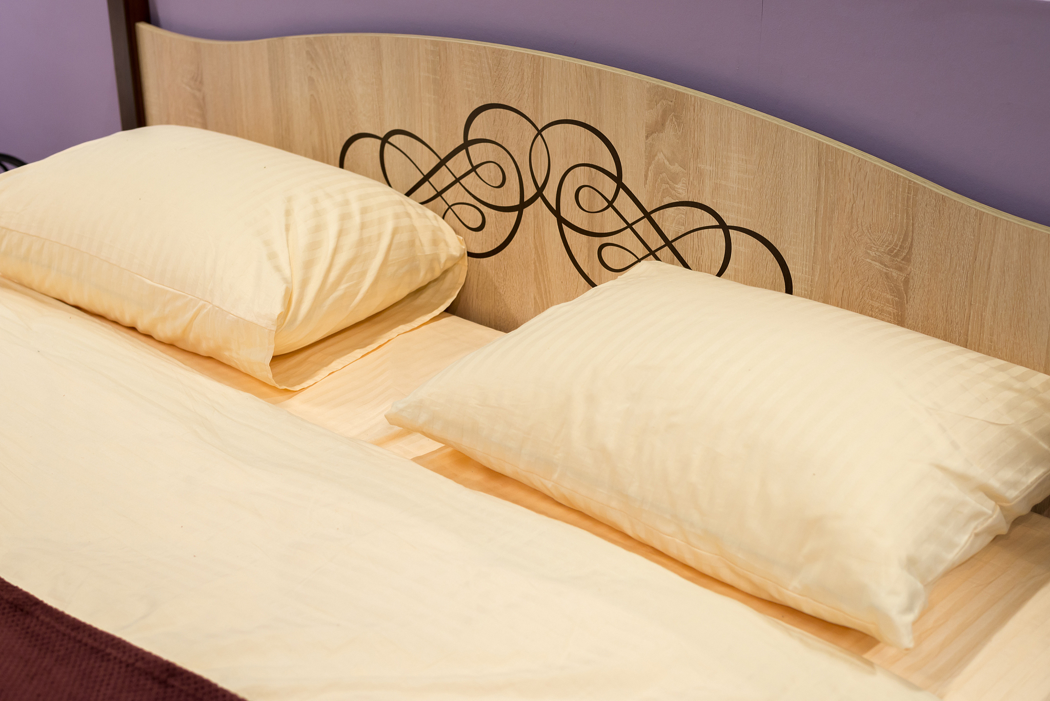 pillows on the bed in  bedroom