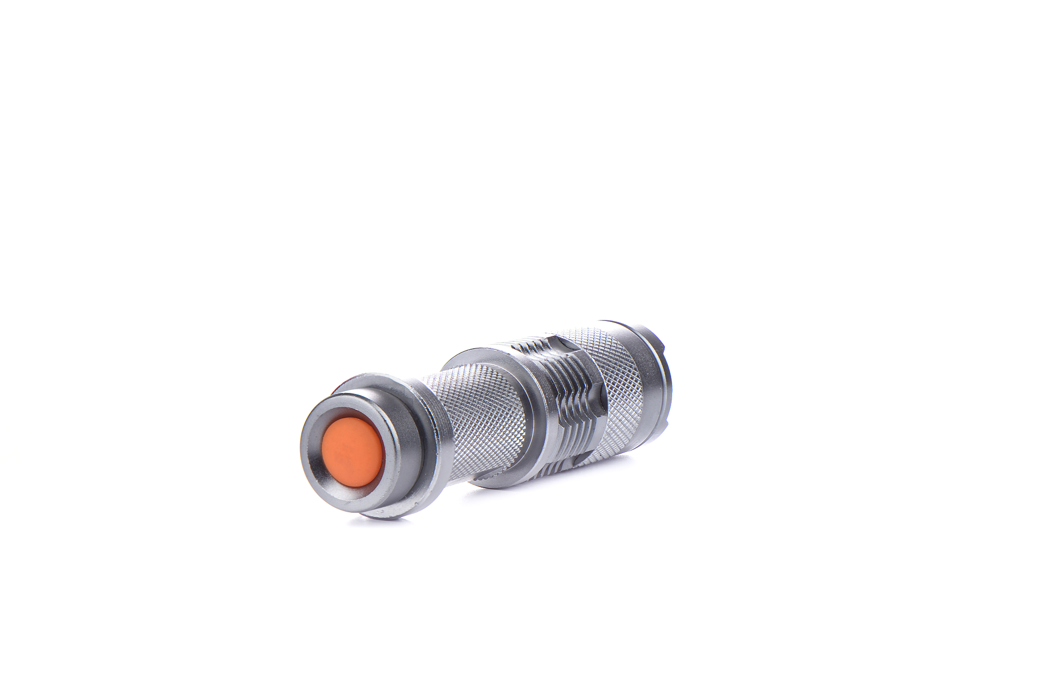 pocket flashlight in a metal case on a white background.