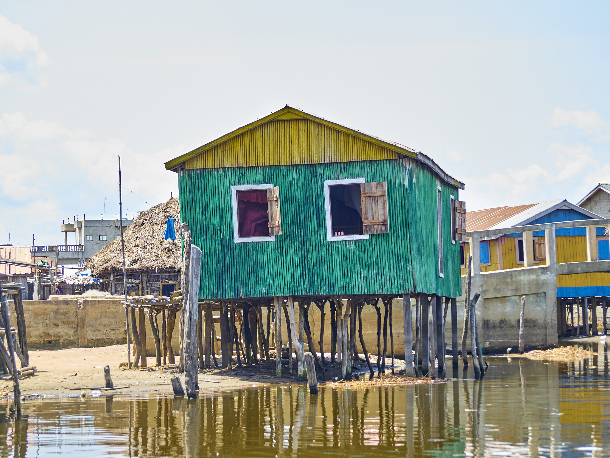 benin,atlantiquedepartment, ganvie, stilt houses on shore of lak