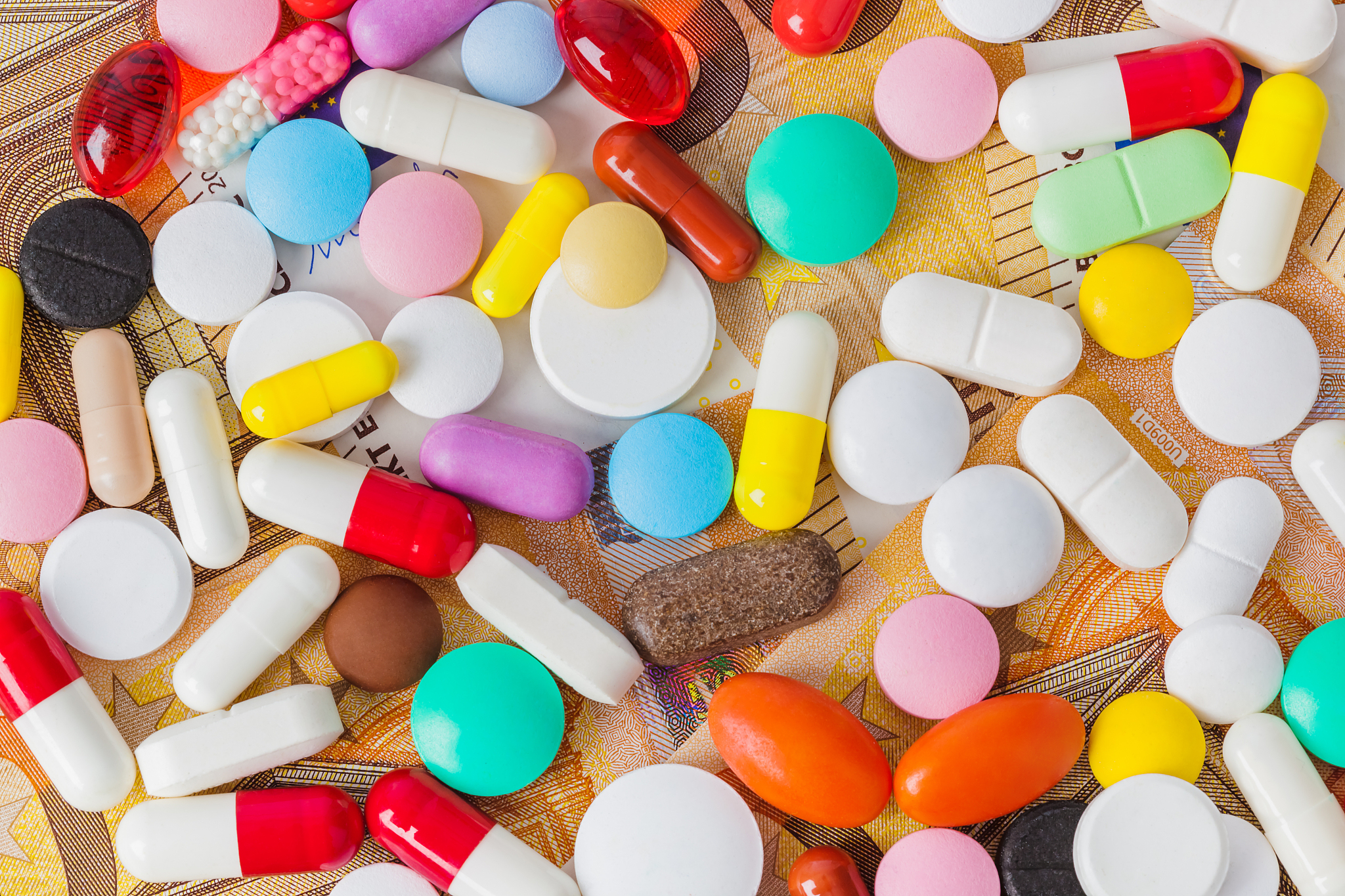pills and money - business medical background