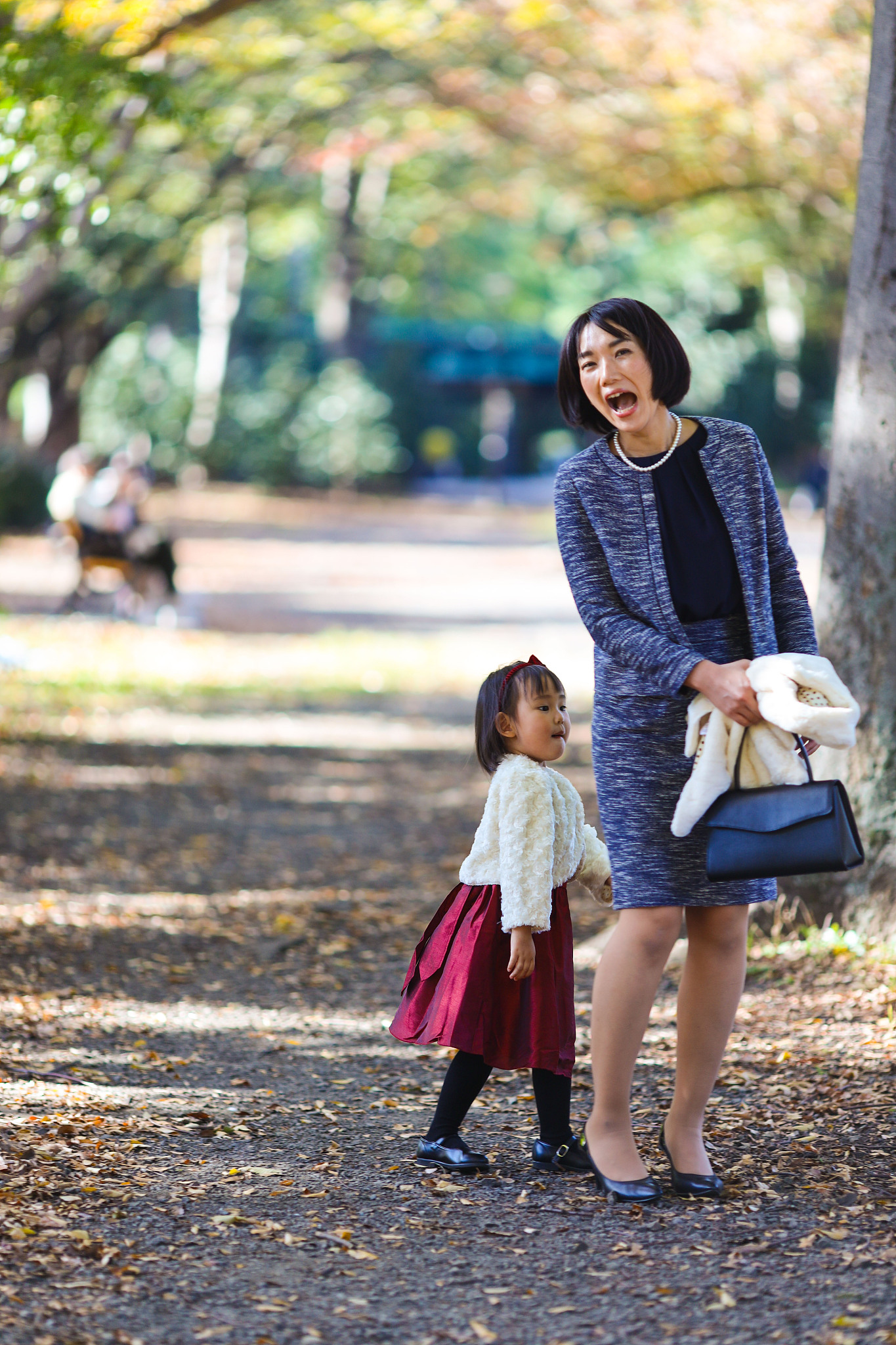 japanese mother walking  with her daughter at shichi go san cele