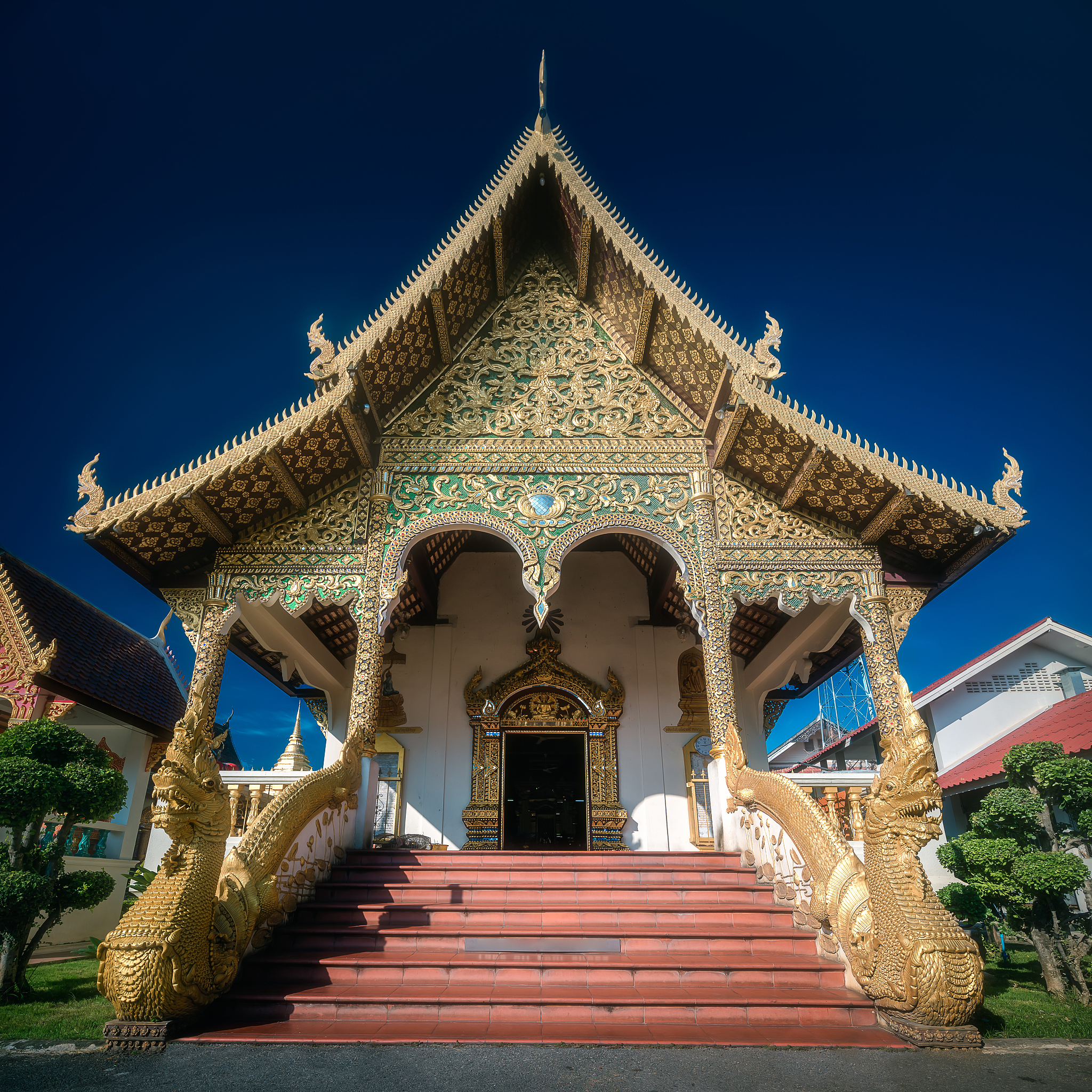buddhist temple chiang mai with dragons, thailand