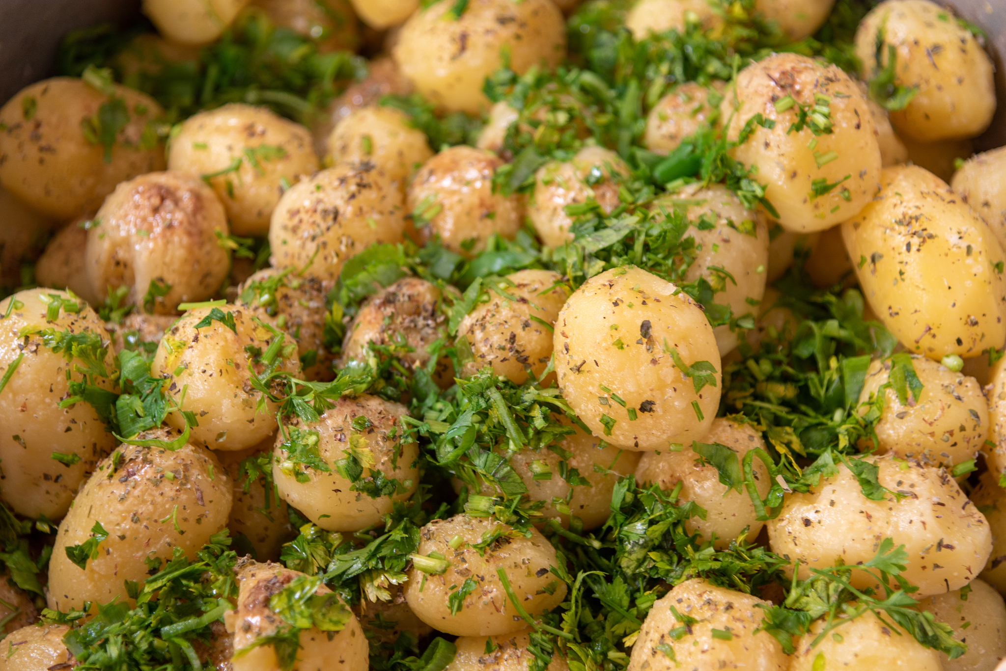 a batch of sauteed english potatoes seasoned with brazilian