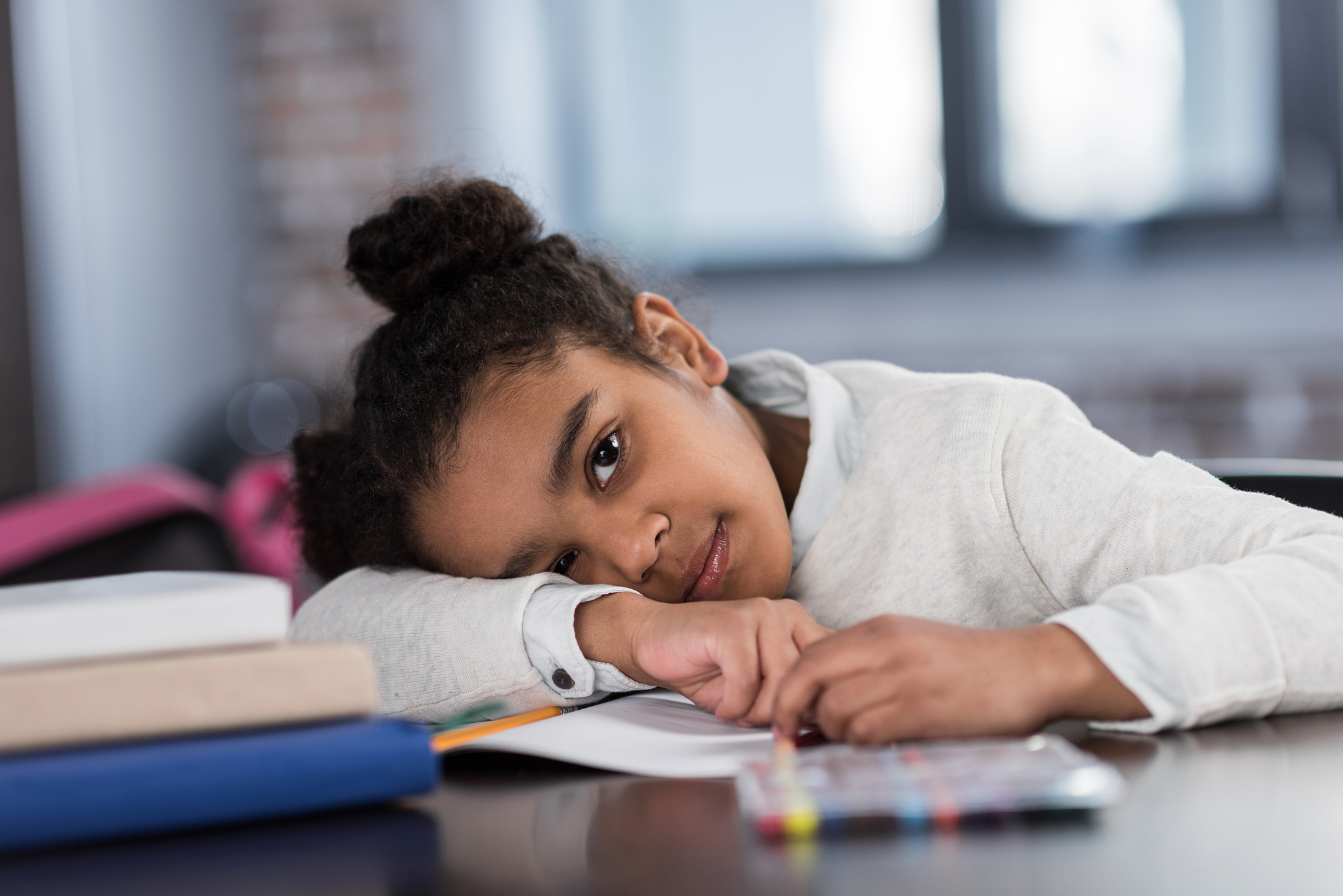 african american schoolgirl doing homework, elementary school st