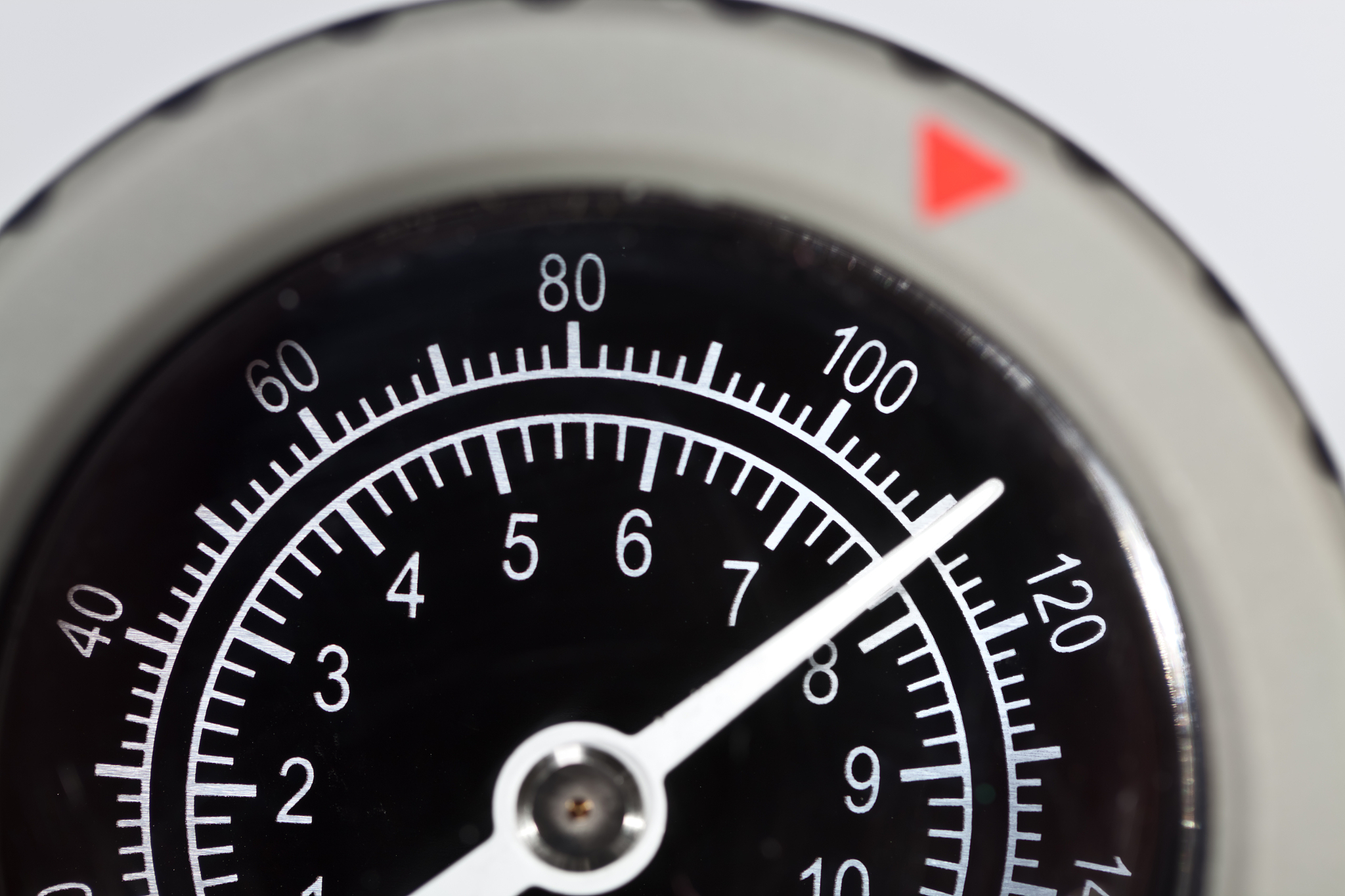 close up of pressure gauge dial at 110