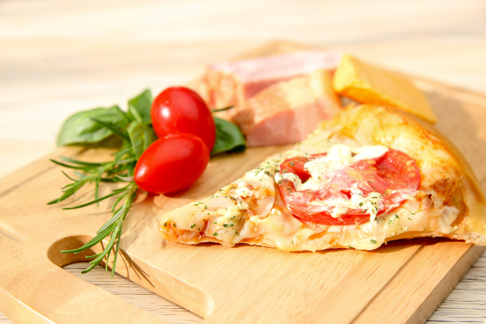 pizza on a cutting board