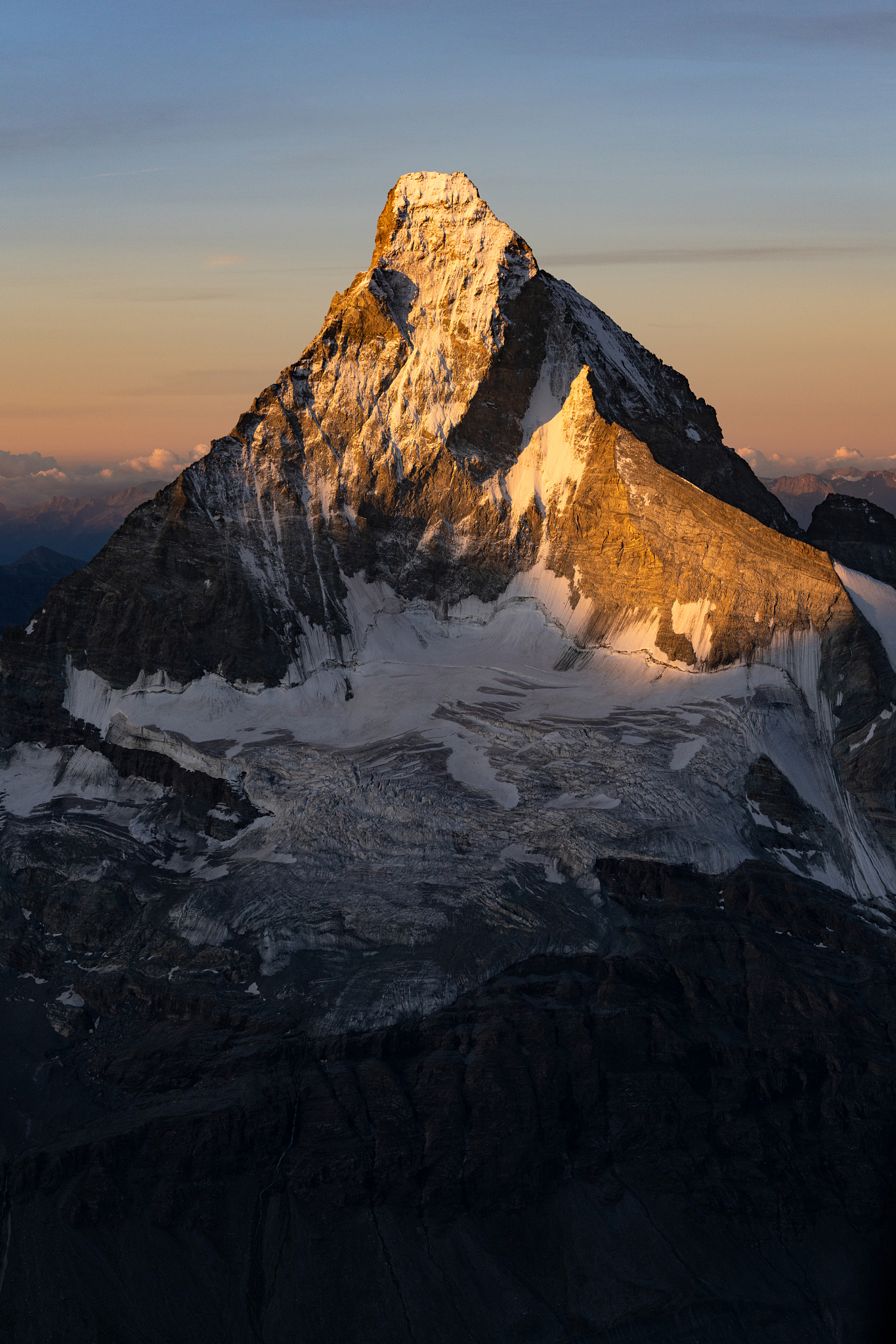 aerial view of matterhorn and the snow capped peaks around it in