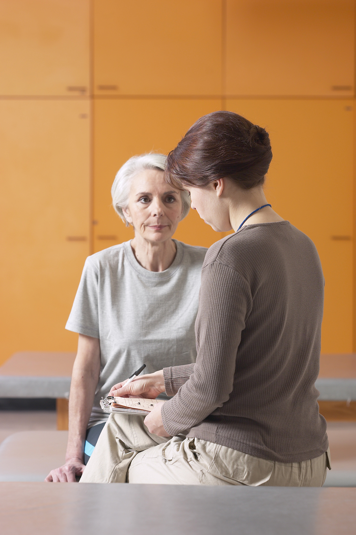 physical therapist and patient