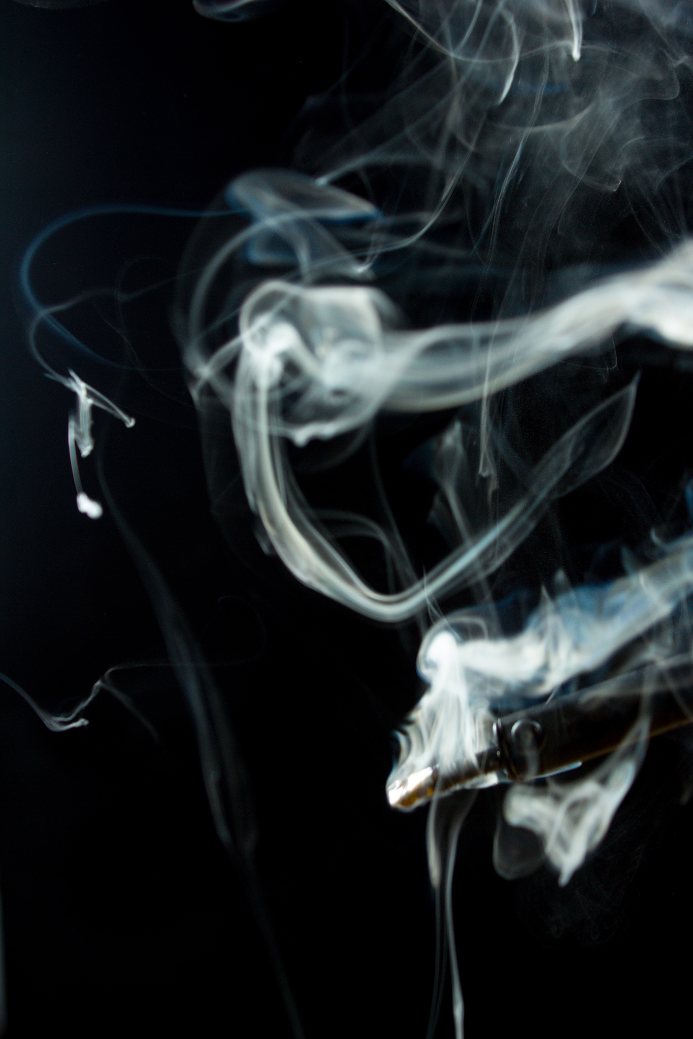 heated soldering iron with smoke from the sting of burning rosin