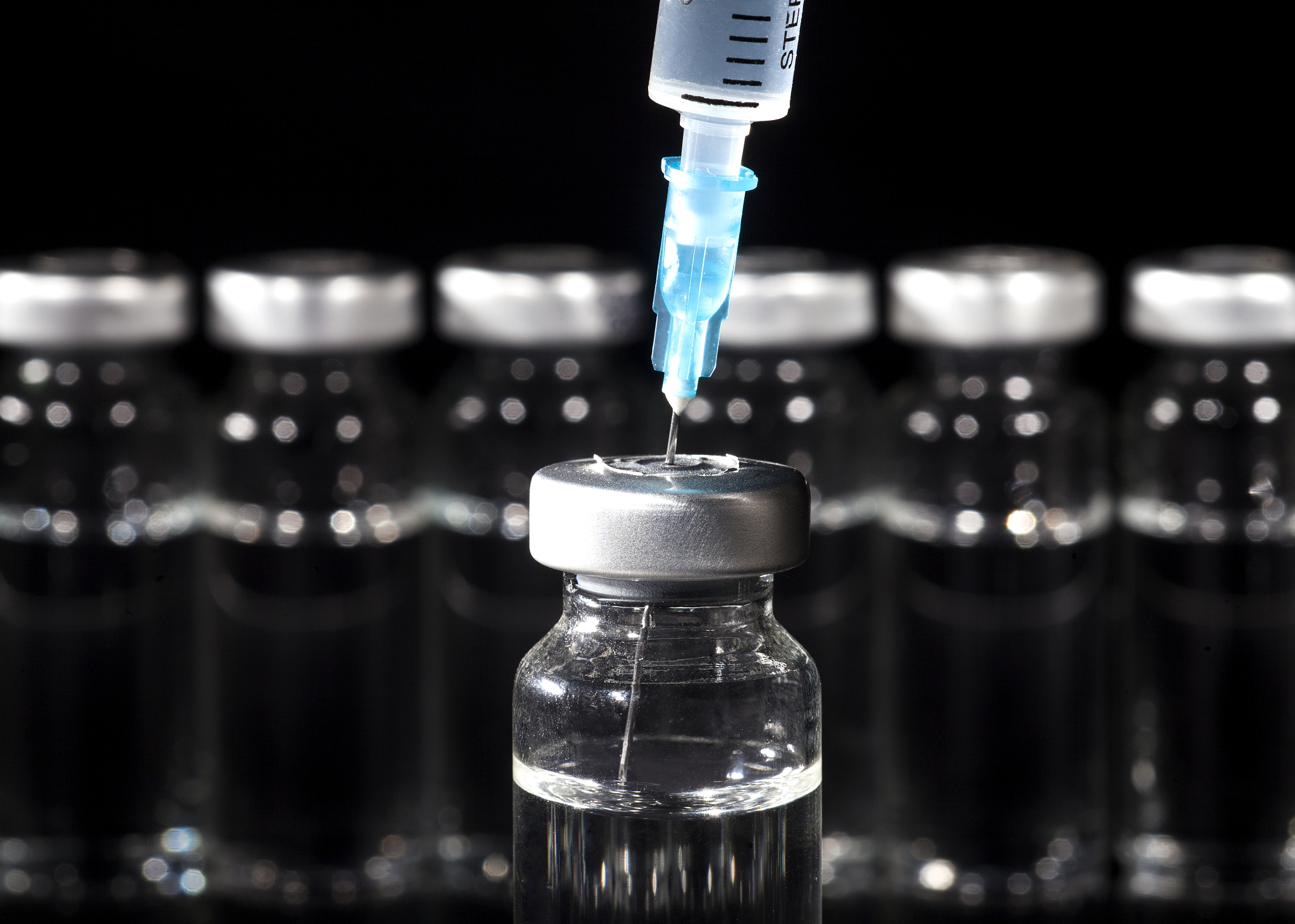 glass medicine vials and syringe