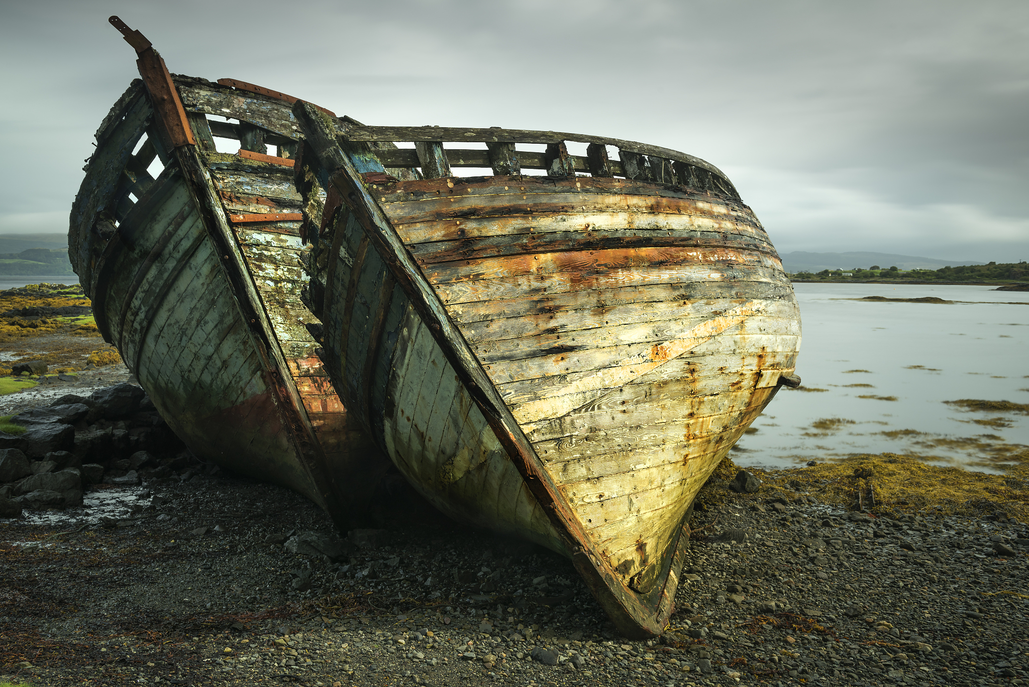 close-up of abandoned boat moored on beach against sky,salen,isl