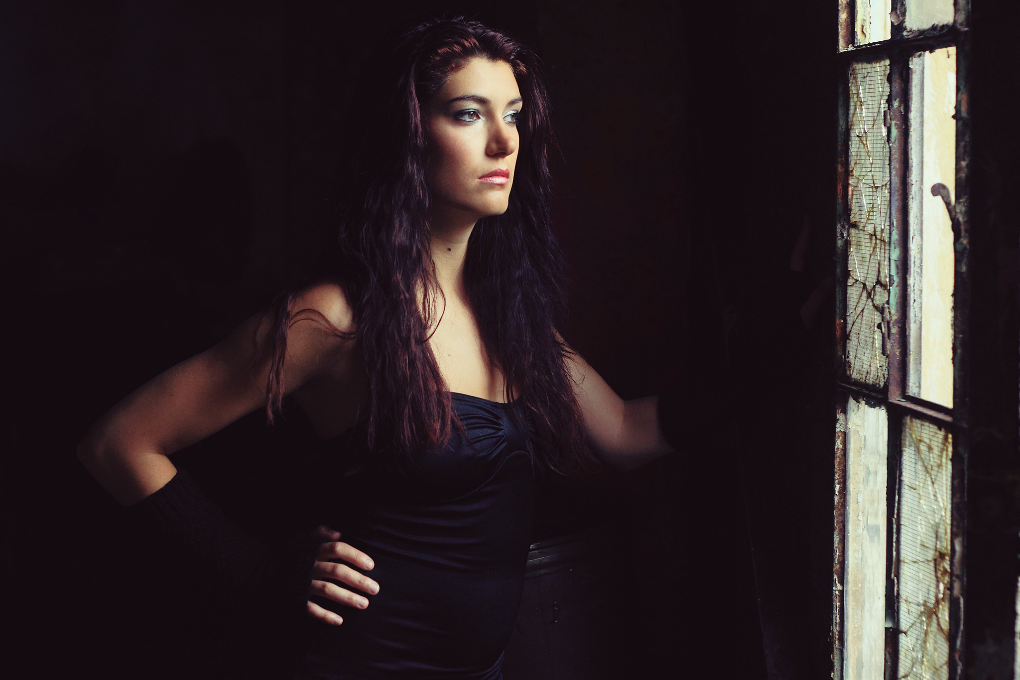 beautiful brunette in a old building
