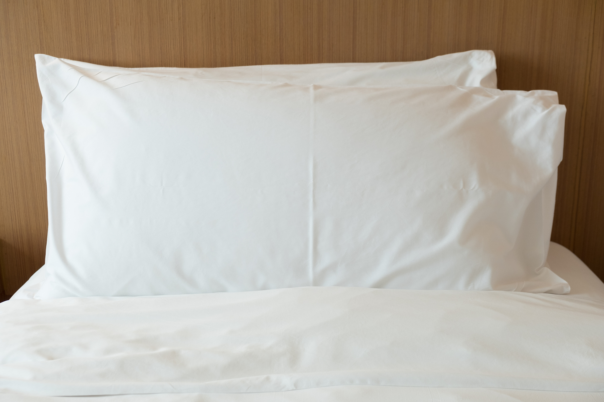 close up comfortable soft pillows on the bed