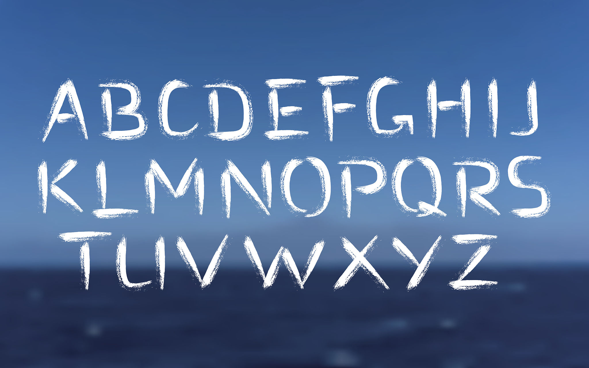 brush font bold letters on sea background