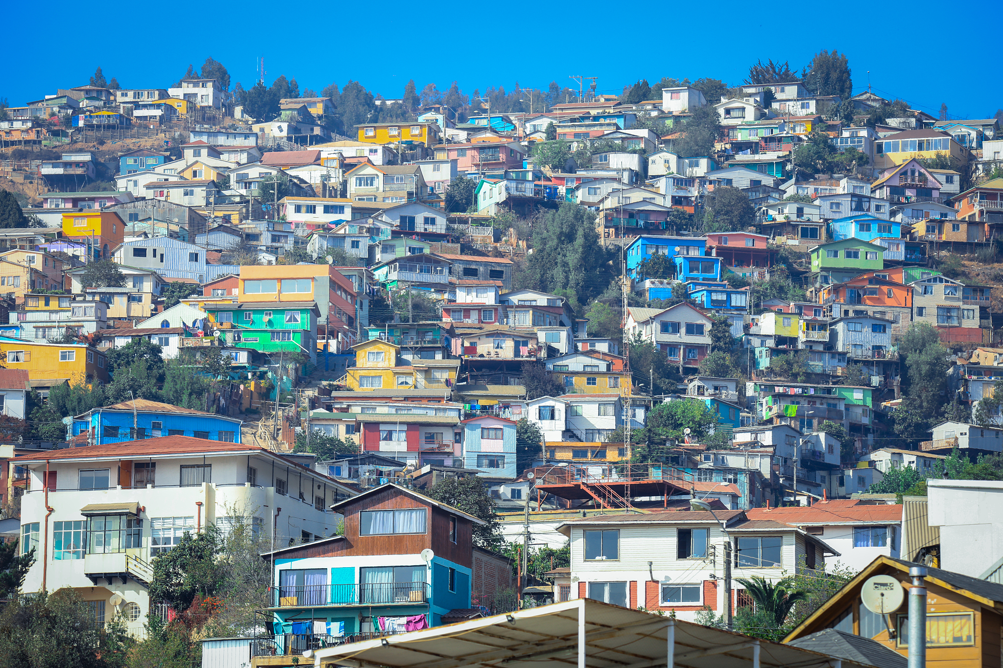 colorful and bright houses on the mountain hills of valparaiso, 