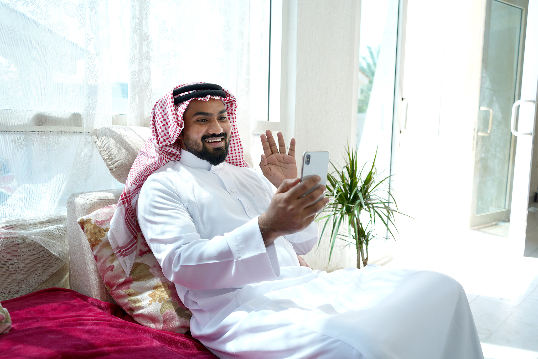 saudi arab man doing video call