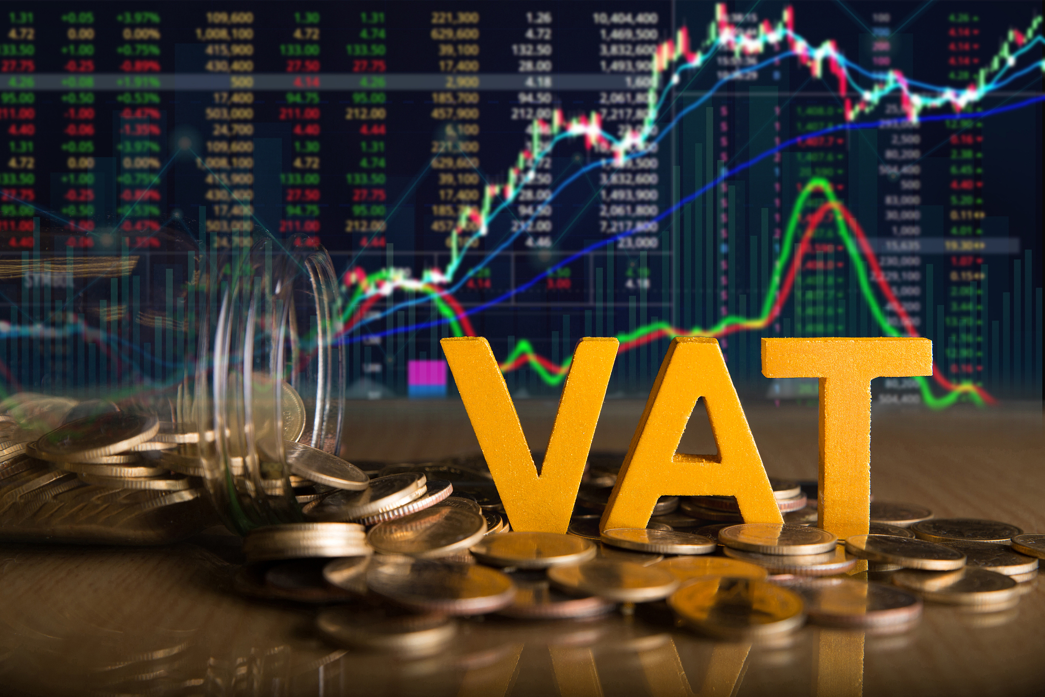 vat concept.word vat put on coins and glass bottles with coins i