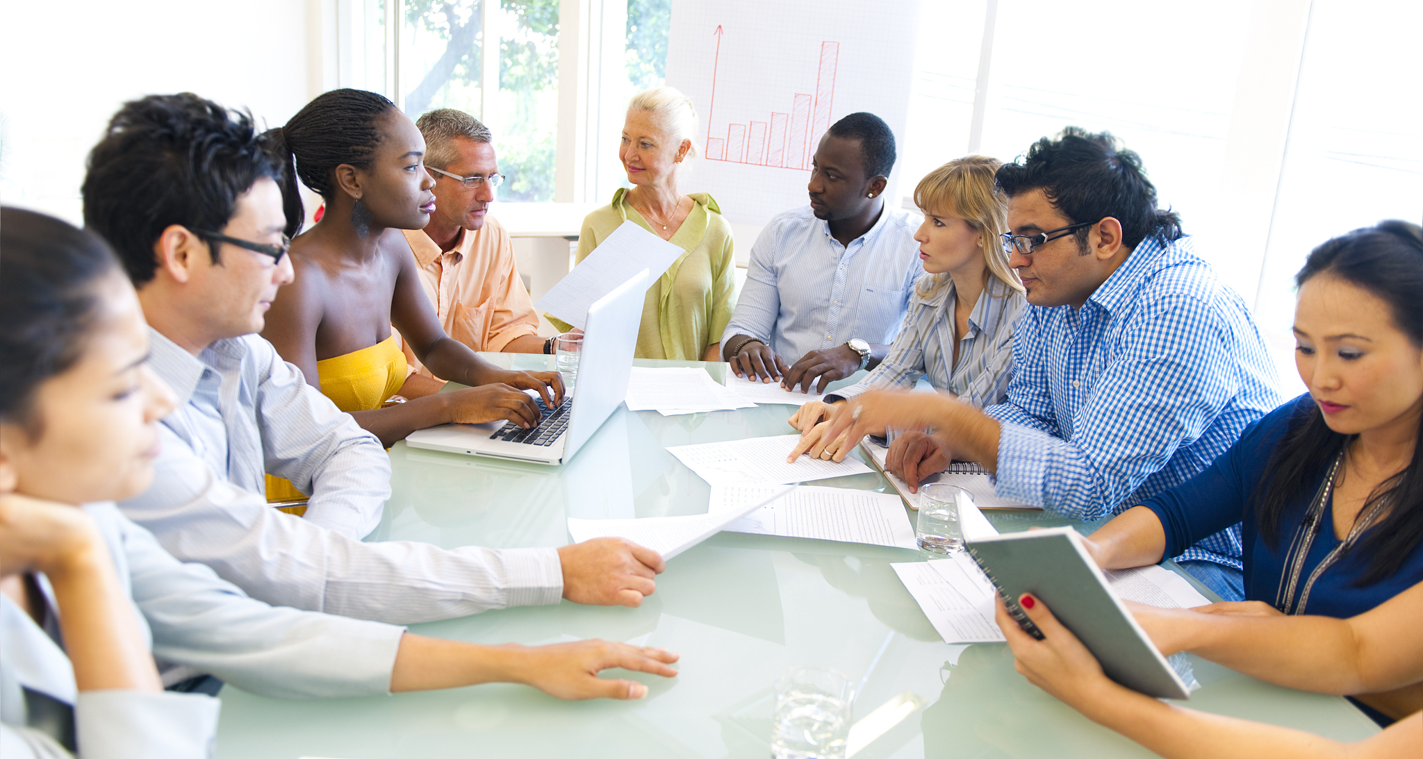 large group of multi ethnic real people working together