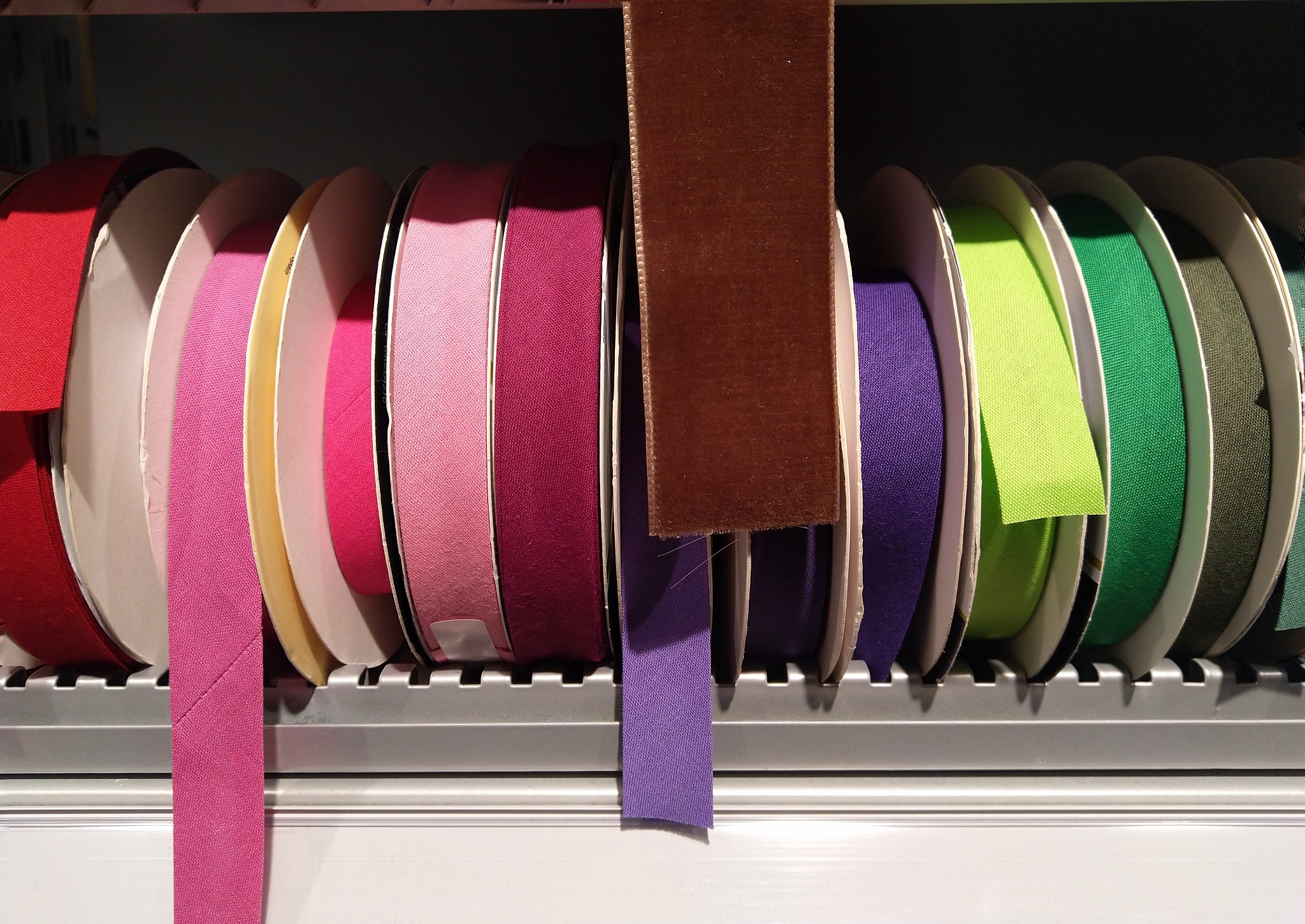 close-up of multi colored ribbons for sale in store