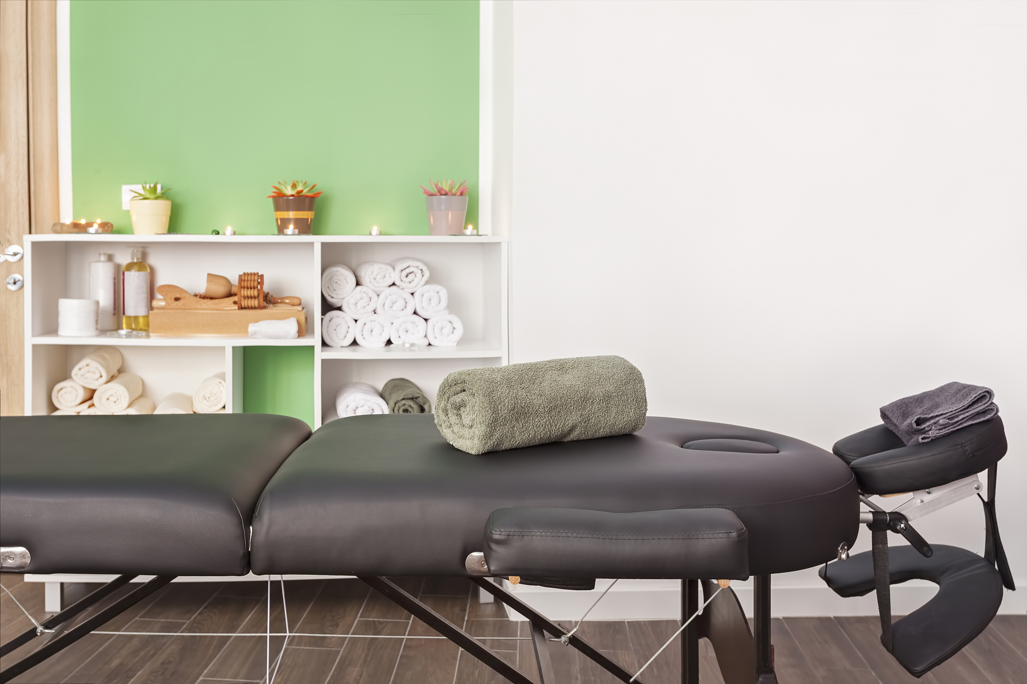 place for relaxation in modern wellness salon with table bed