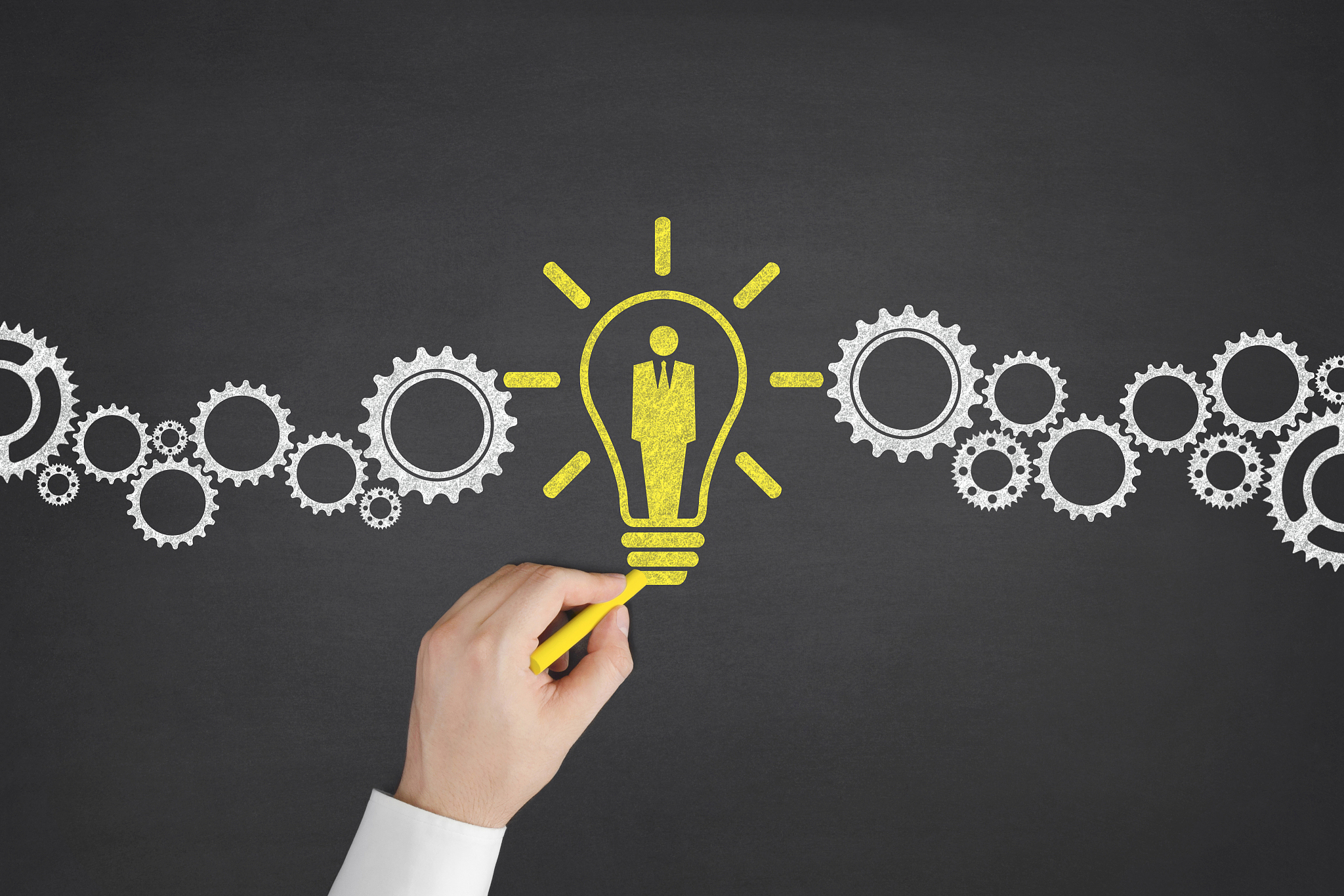 human resources with gears on blackboard