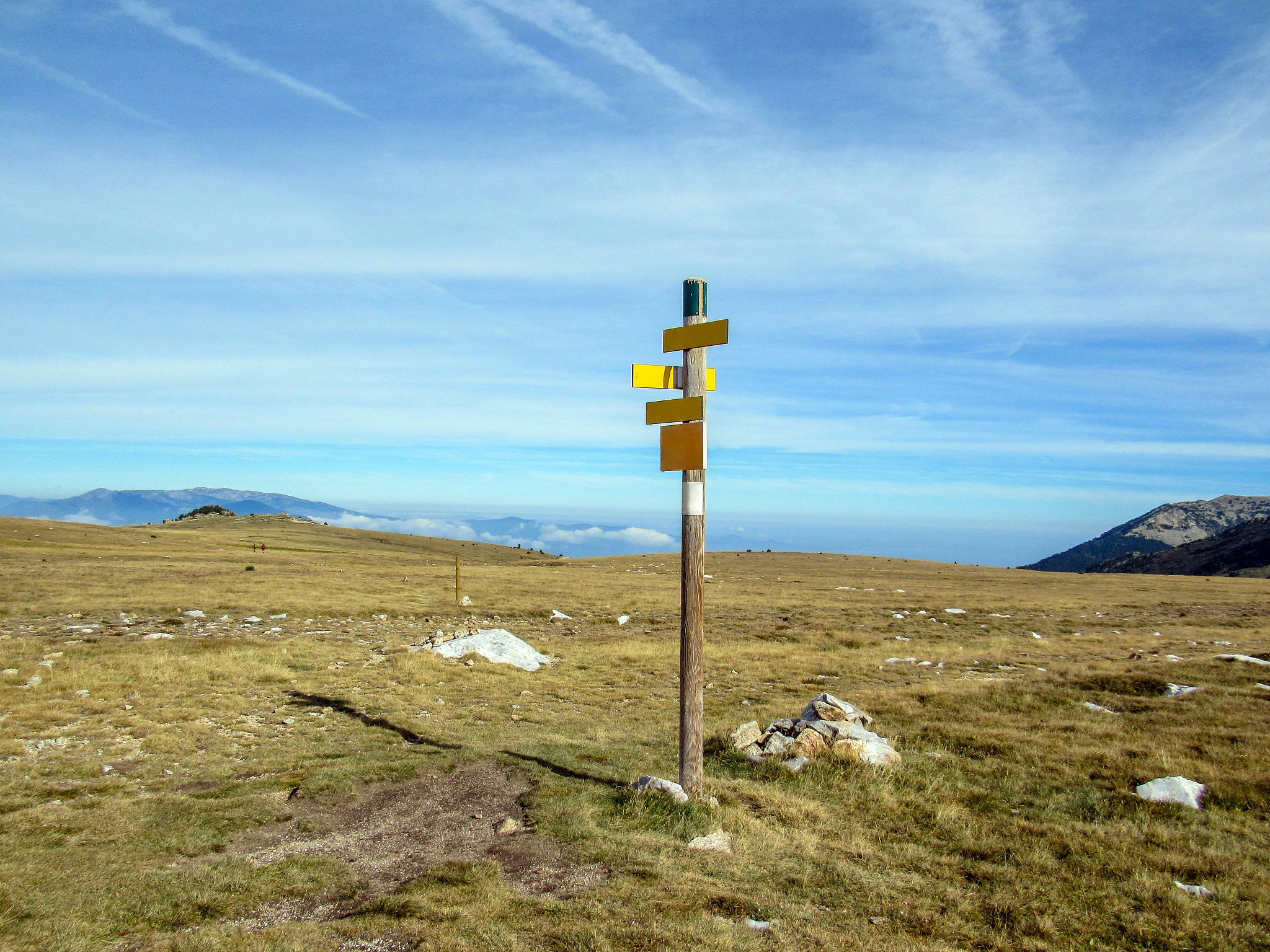 mountain signpost with no text, the pla guillem plateau, eastern