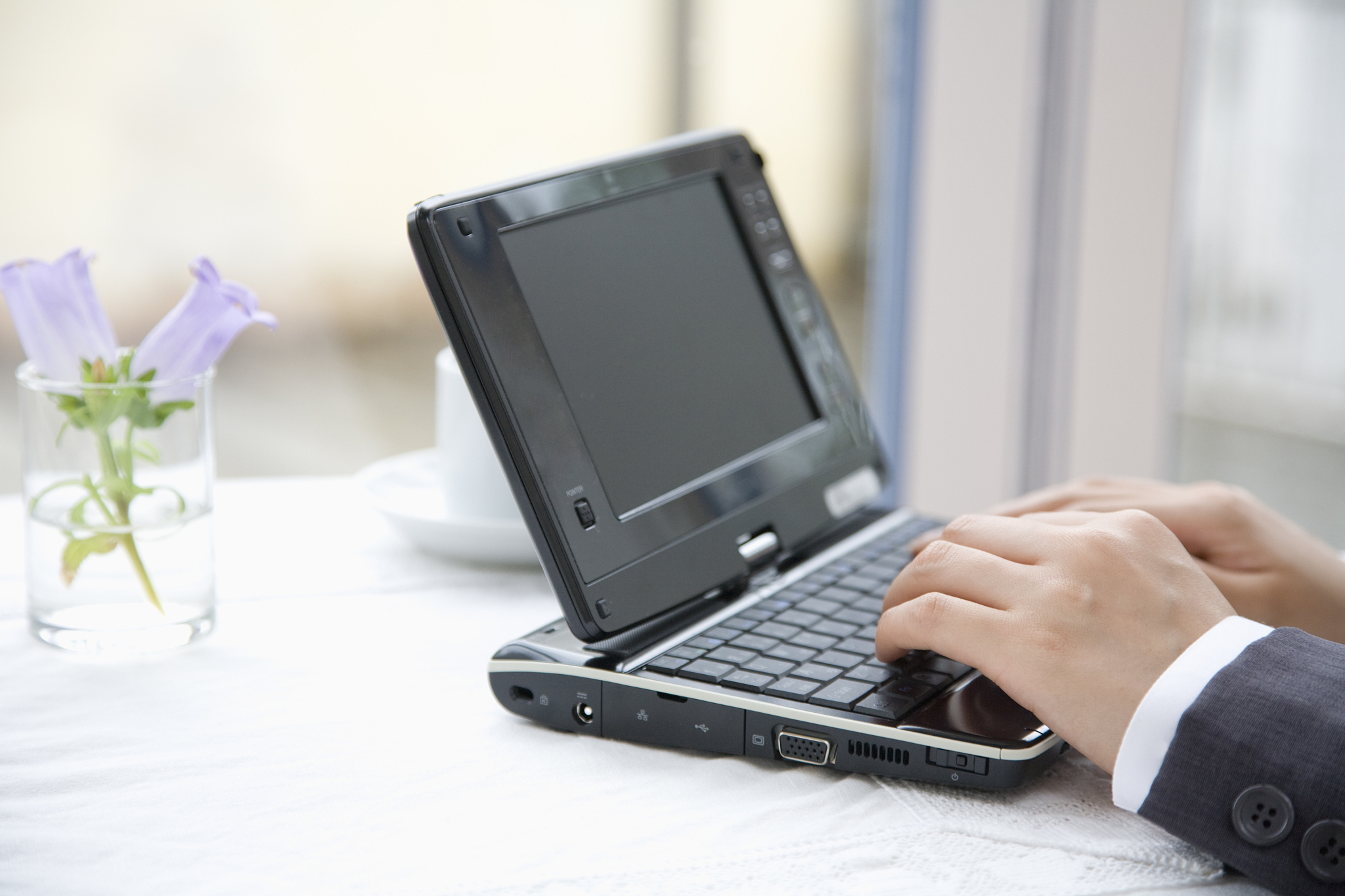 operating a laptop pc.