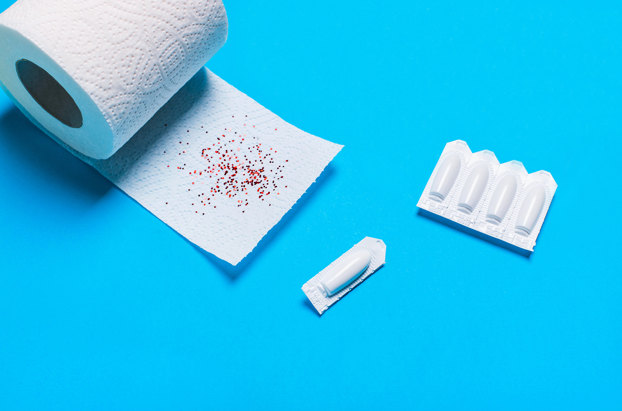 suppository and toilet paper for the treatment of hemorrhoids